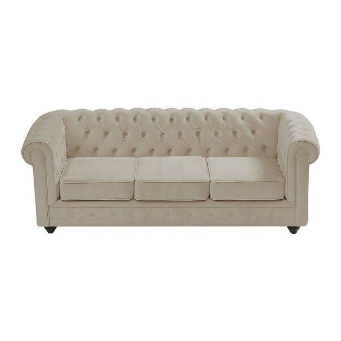Sofá Chesterfield de 3 plazas en terciopelo beige.