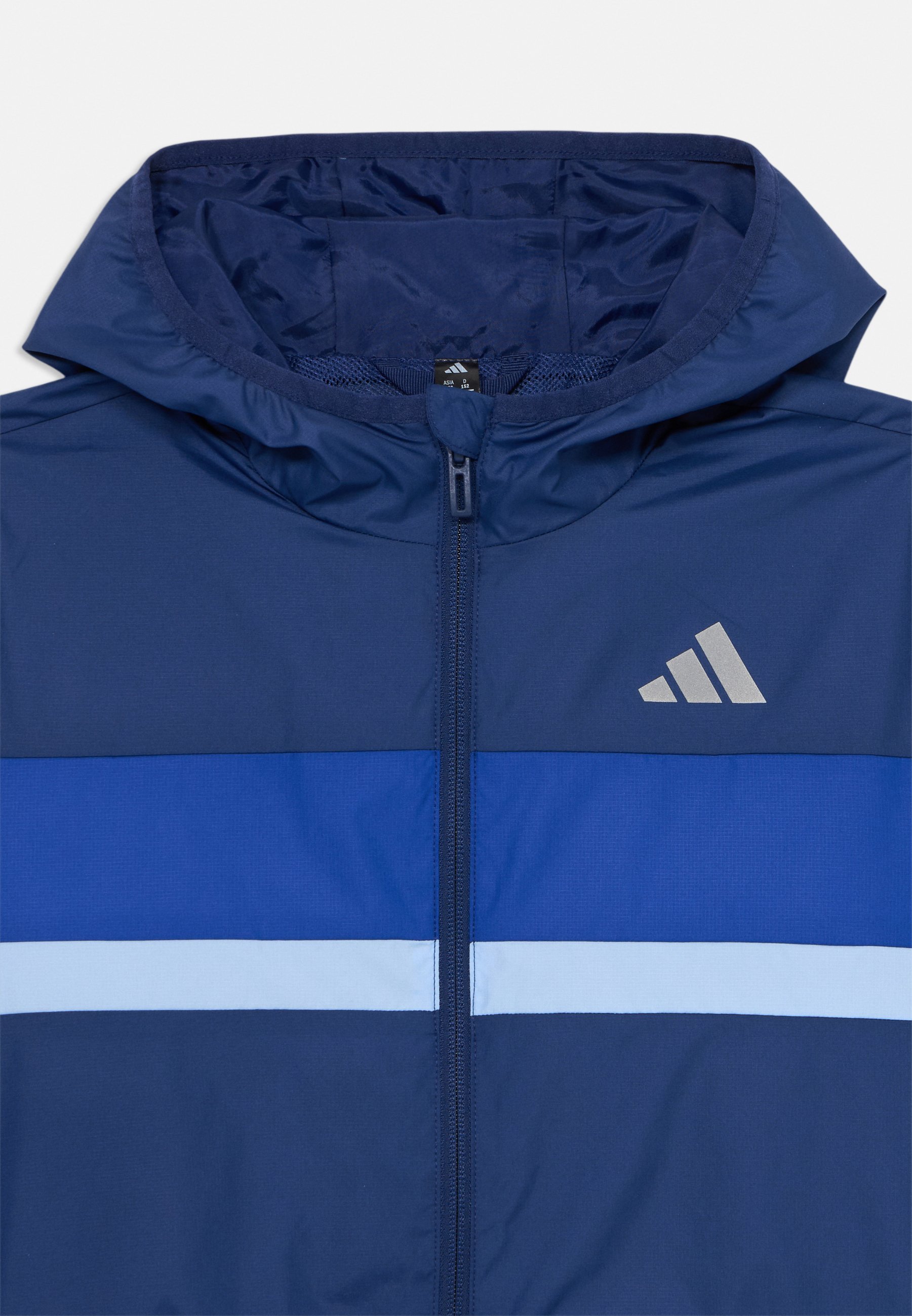 adidas Performance TIBERIOERIO JUNIOR UNISEX - Coupe-vent - bleu foncé/bleu roi/bleu fluo