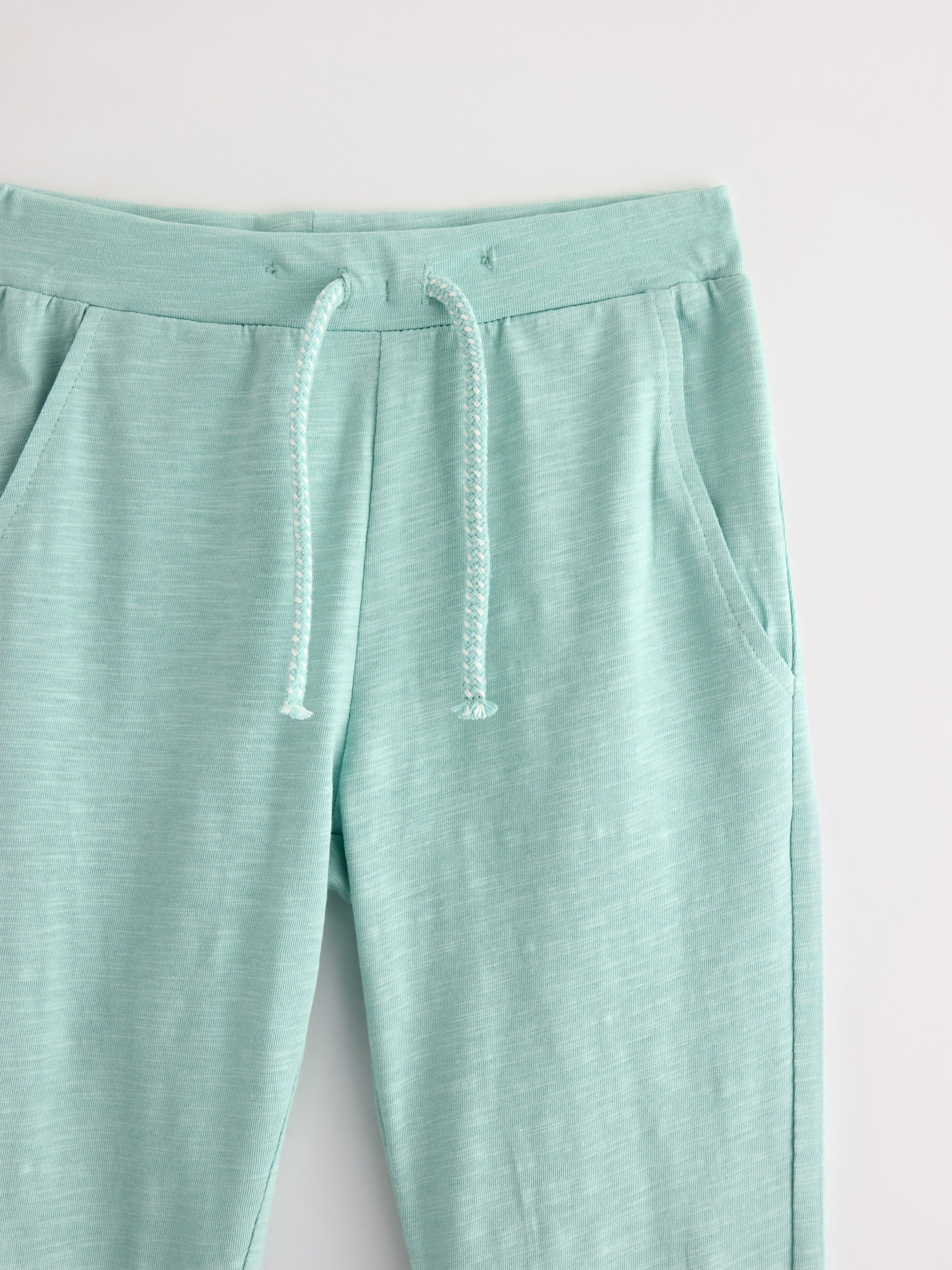 Pantalones deportivos de punto slub color turquesa claro empolvado