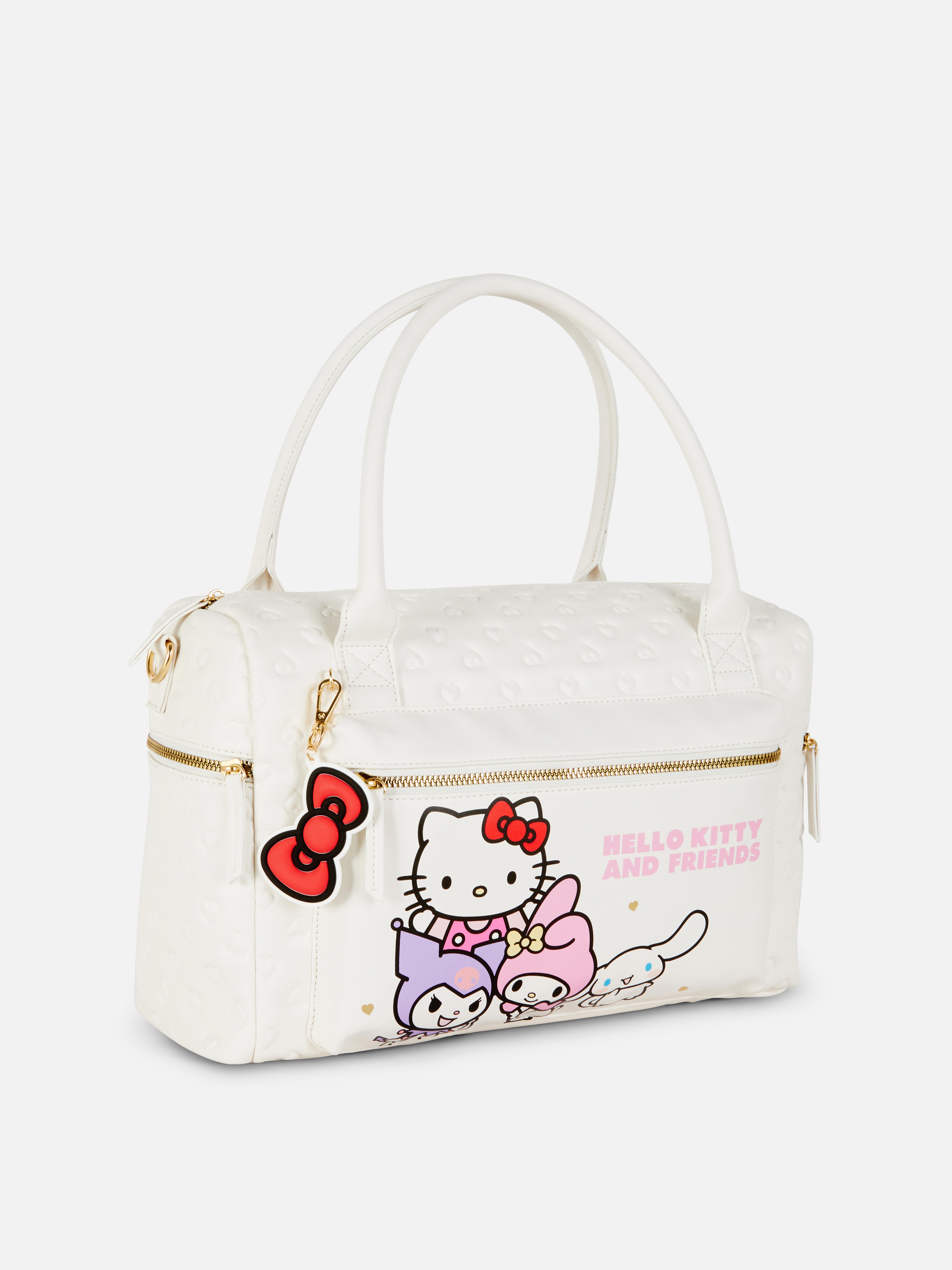 Geantă de weekend Hello Kitty and Friends O geantă de weekend cu personaje Sanrio, fermoare și mânere superioare