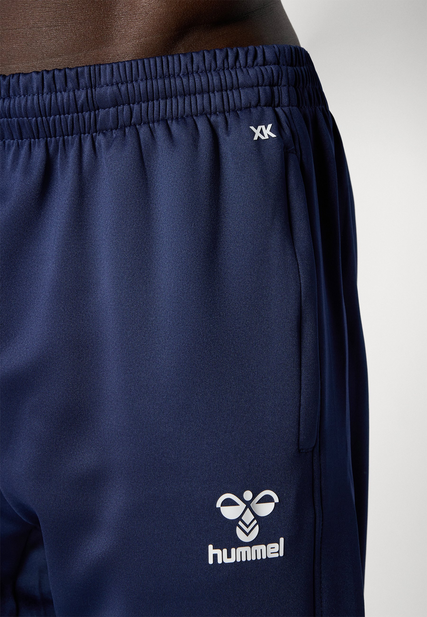 Pantaloni Hummel HMLCORE - Pantaloni da tuta - colore blu navy