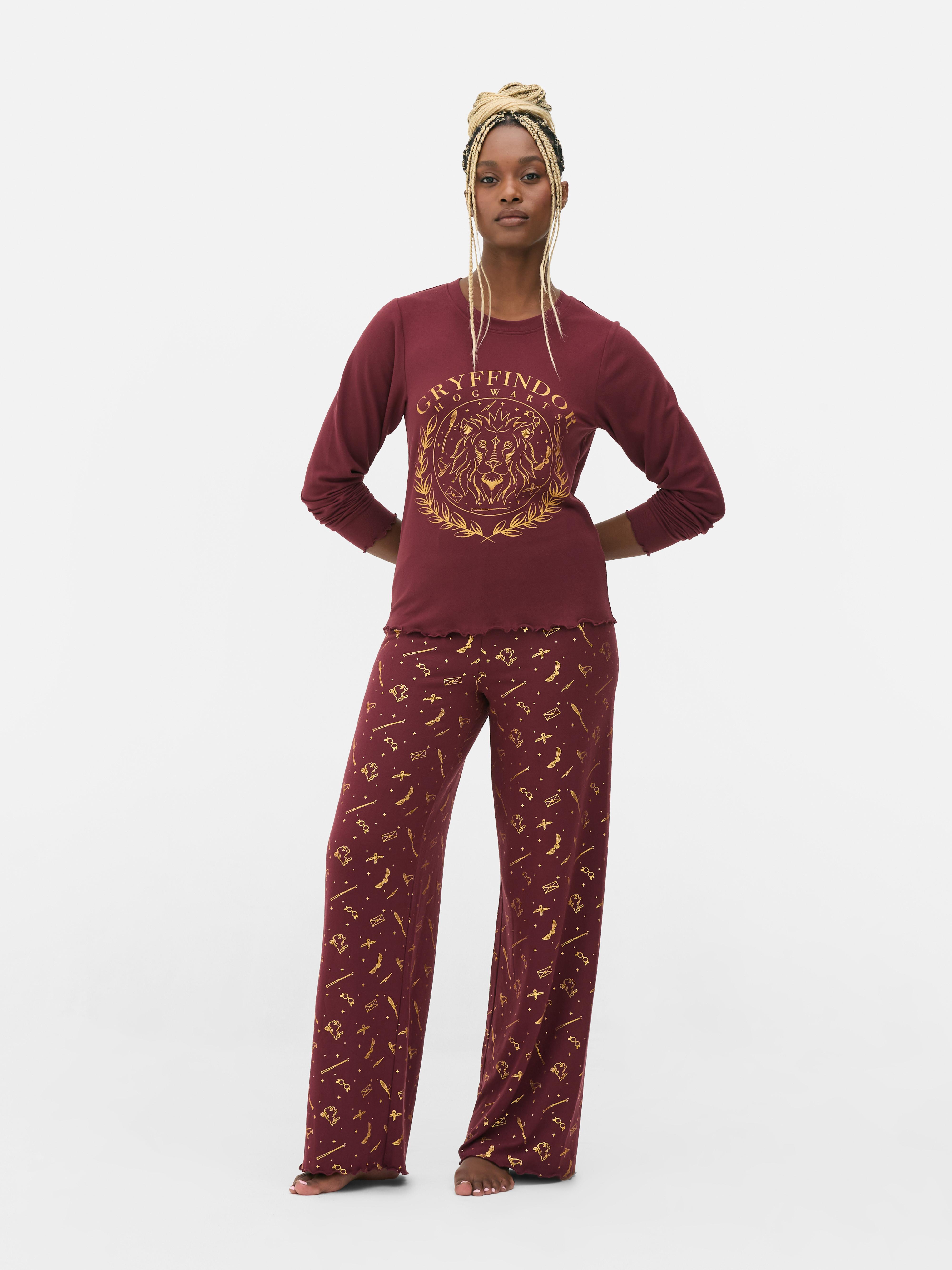 Pijamale Harry Potter™ cu Casele de la Hogwarts Pijamale cu top cu mânecă lungă și pantaloni cu casele de la Hogwarts