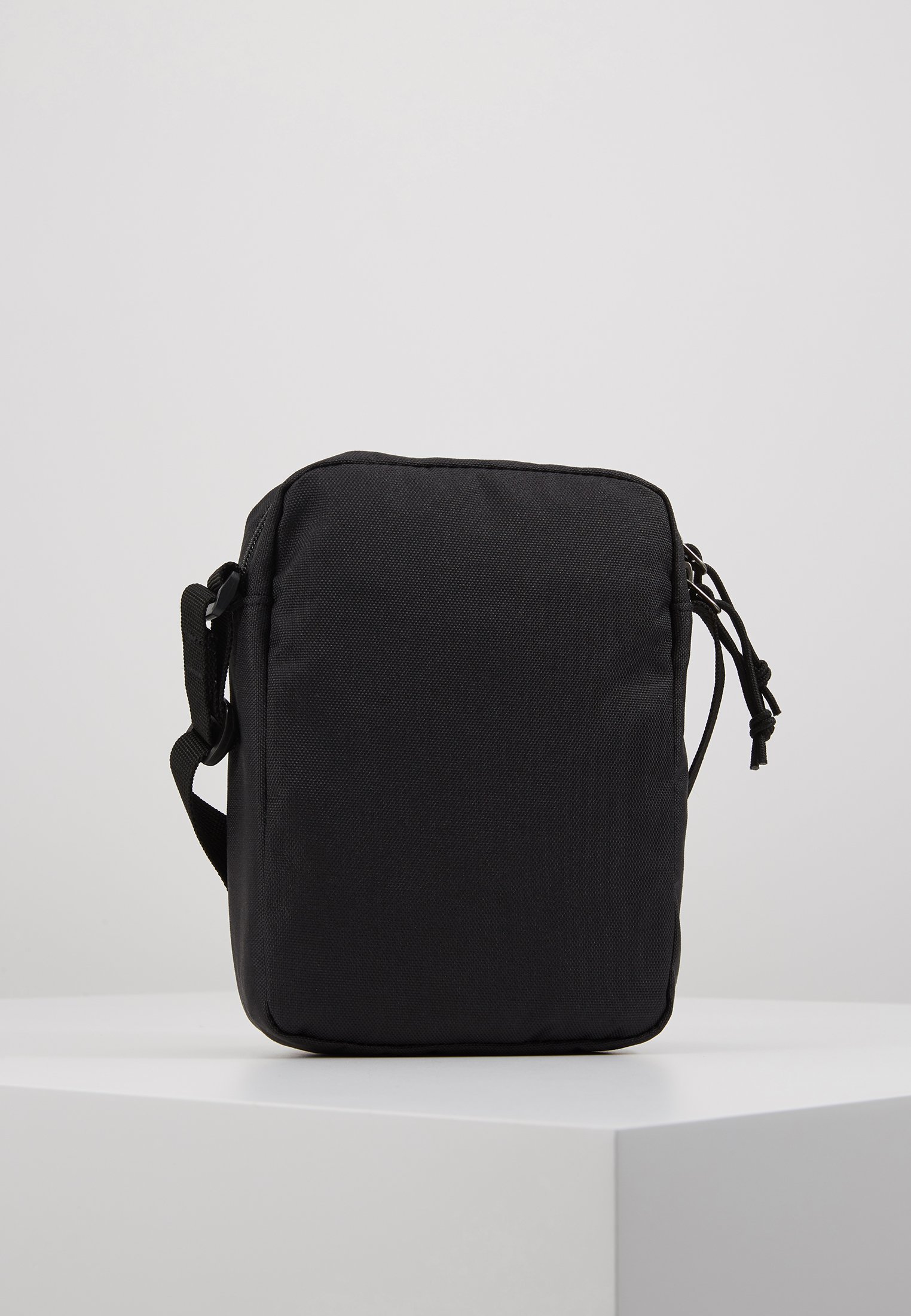 Levi's® MINI CROSSBODY SOLID BATWING UNISEX - Borsa a tracolla - nera