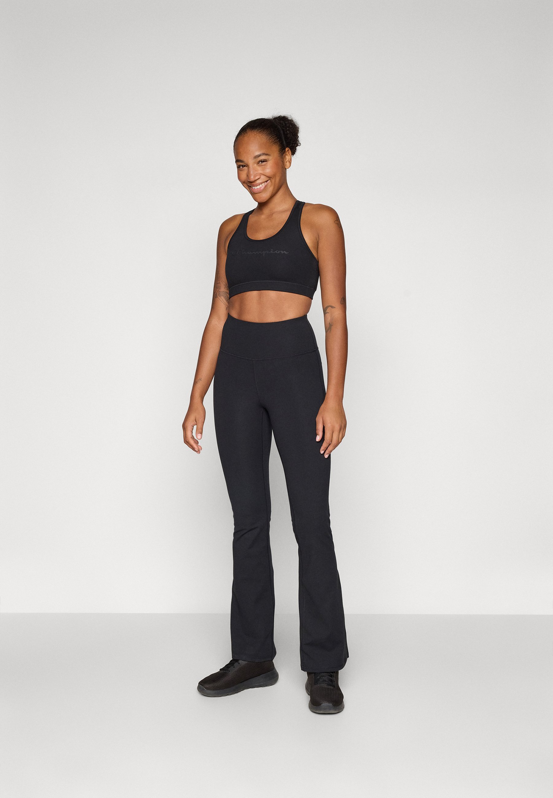 Champion TRAINING FLARE LEGGINGS INTERLOCK - Legíny - čierne