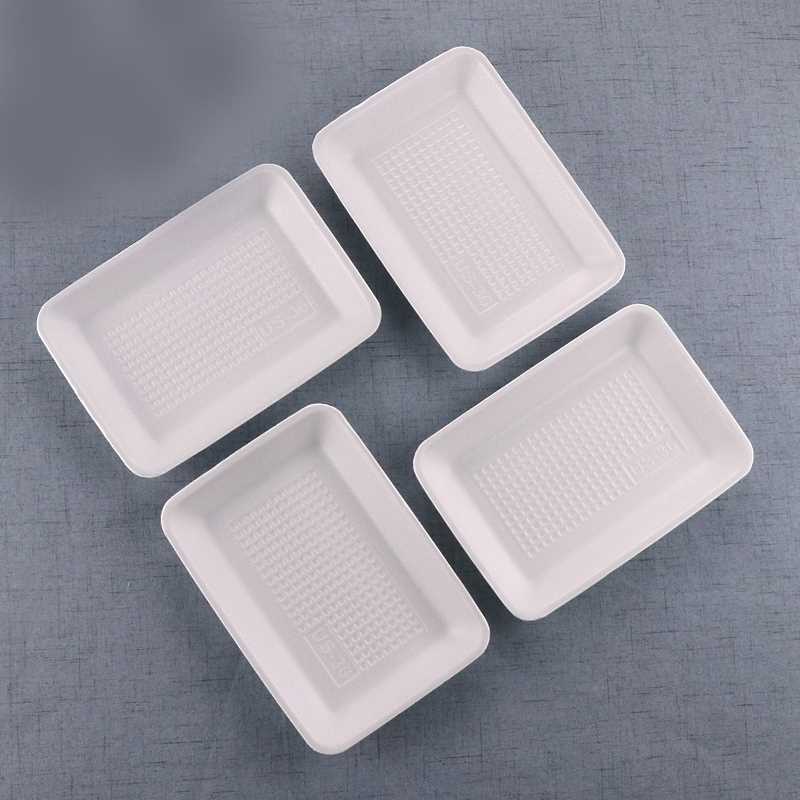 Plateau jetable en mousse plastique de qualité alimentaire (21 x 15 x 2,5 cm) pour emballage de viande surgelée, idéal pour les fêtes et les réceptions.