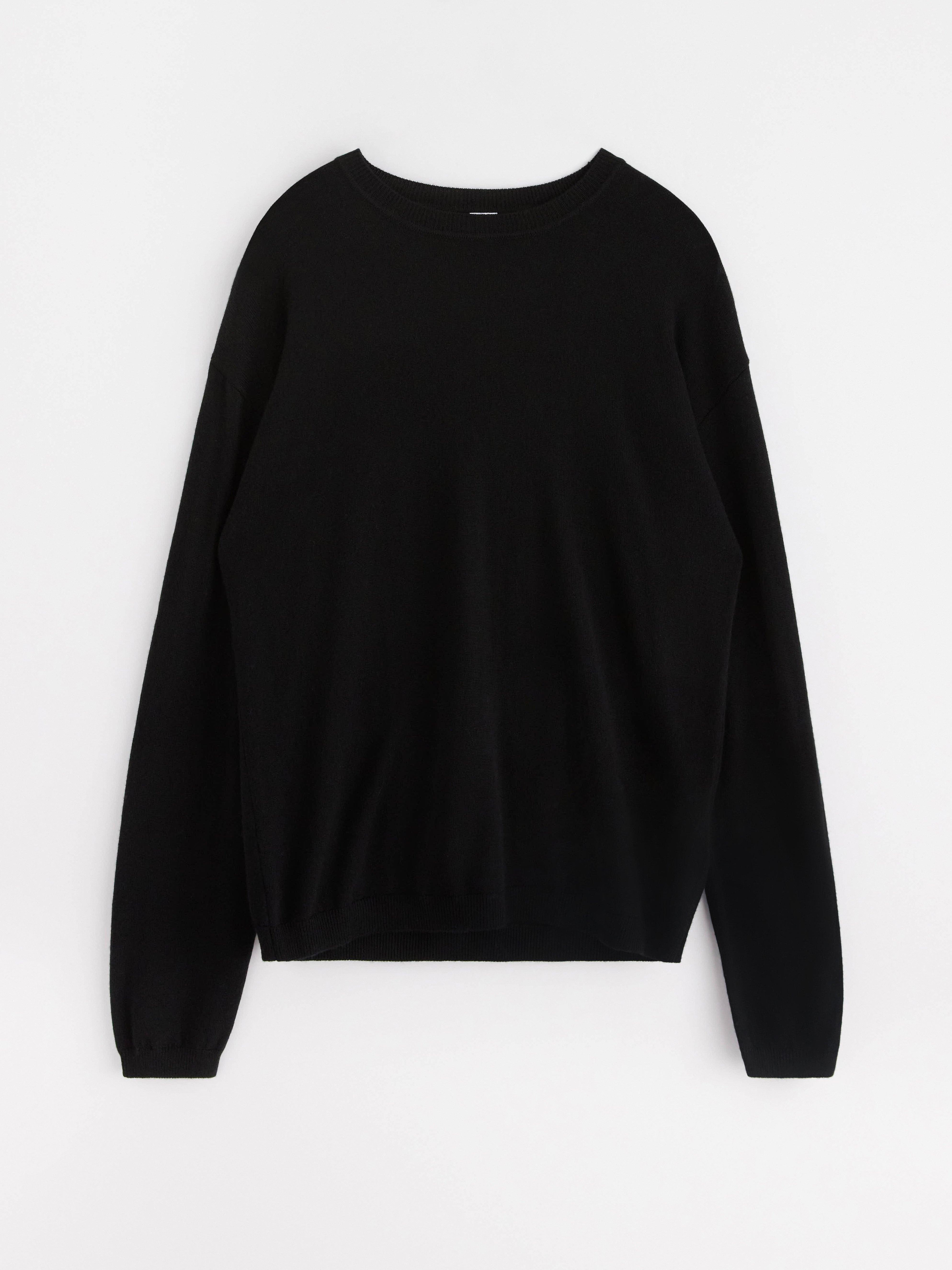 Jersey de punto fino de lana merino negro.