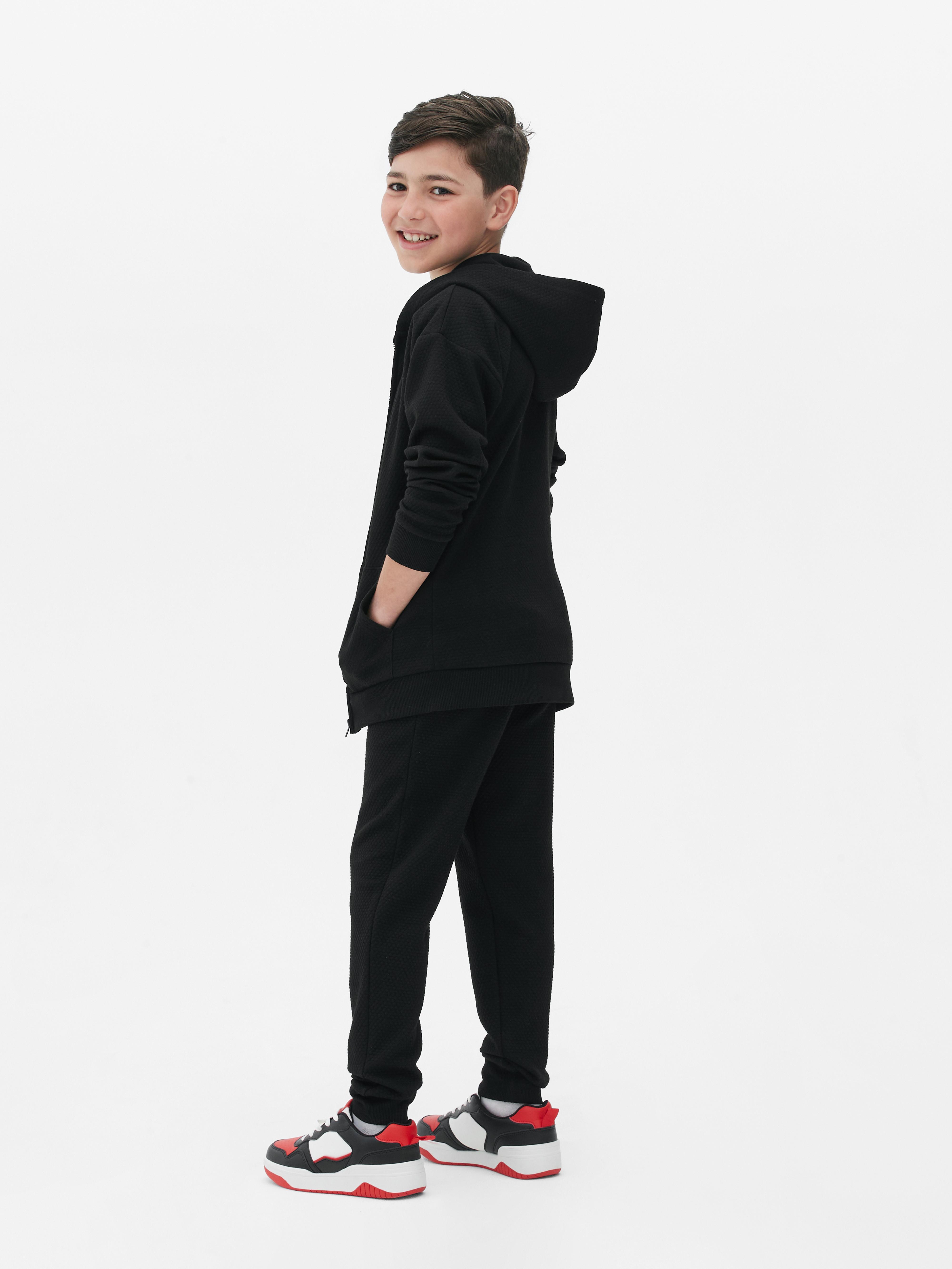Strukturierter Hoodie mit Reißverschluss für ältere Jungen. Mit diesem Hoodie wird ihre Outdoor-Ausrüstung aufgewertet.