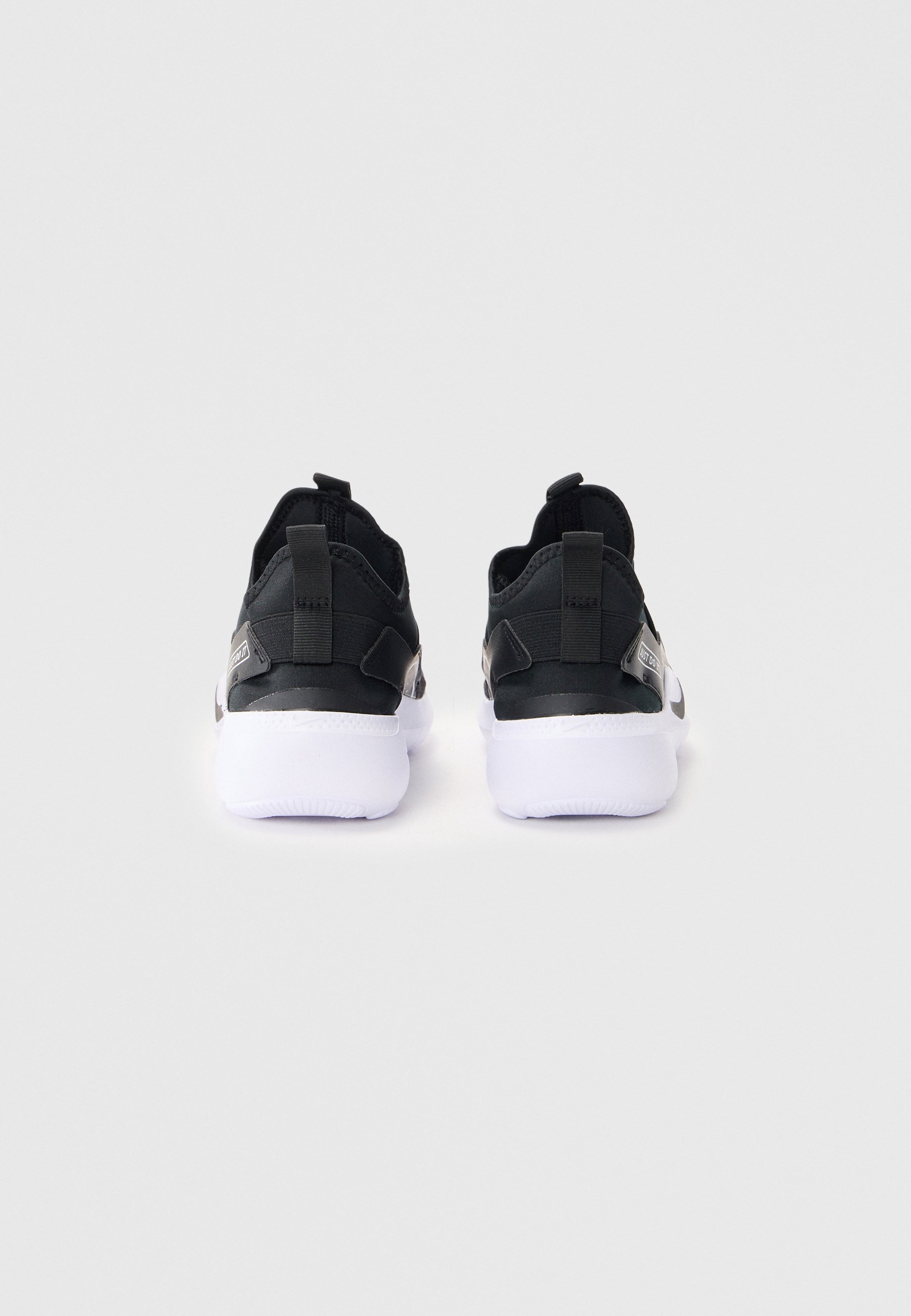 Nike Performance FLEX RUNNER 4 UNISEX - Běžecké boty na silnici - černá/bílá