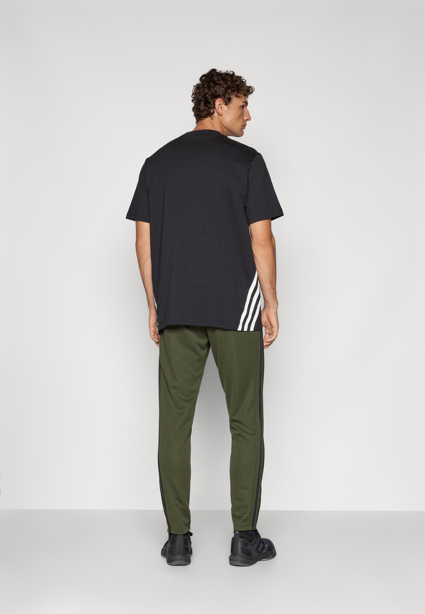 adidas Performance TRAIN ESSENTIALS 3-STRIPES - Teplákové nohavice - tmavomodrá/čierna
