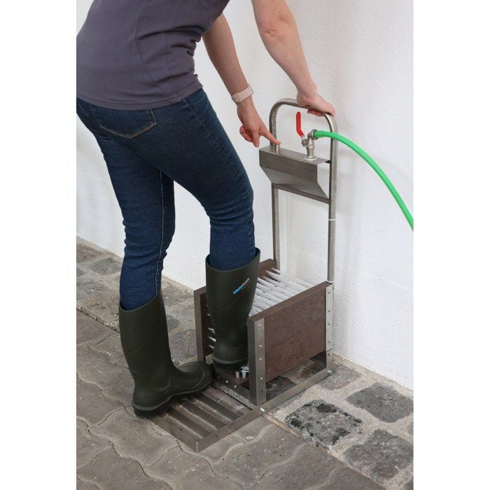 Kit de arandelas para botas desmontado en una caja Kerbl.