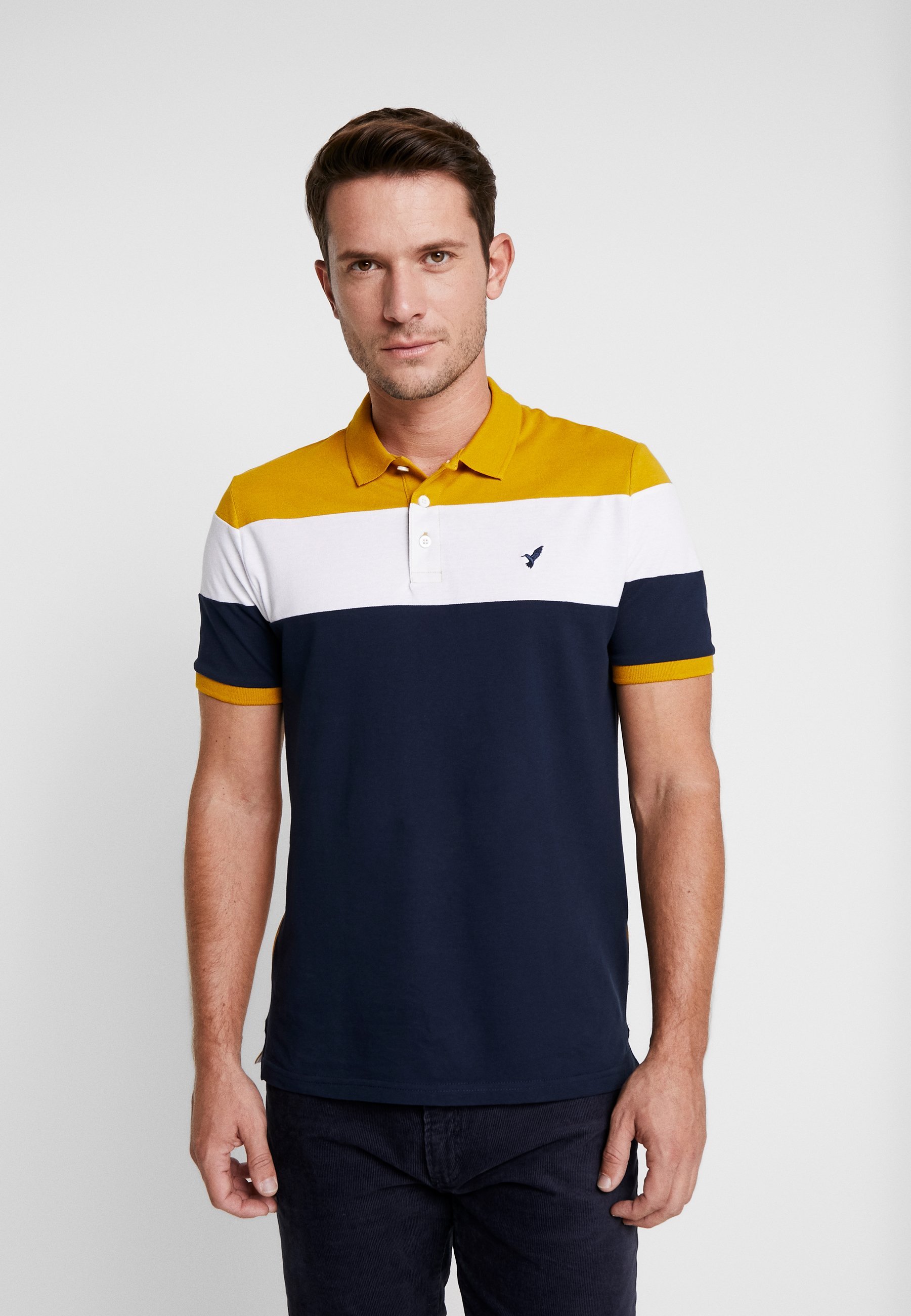 Pier One SLIM - Poloshirt - dunkelblau/senfgelb