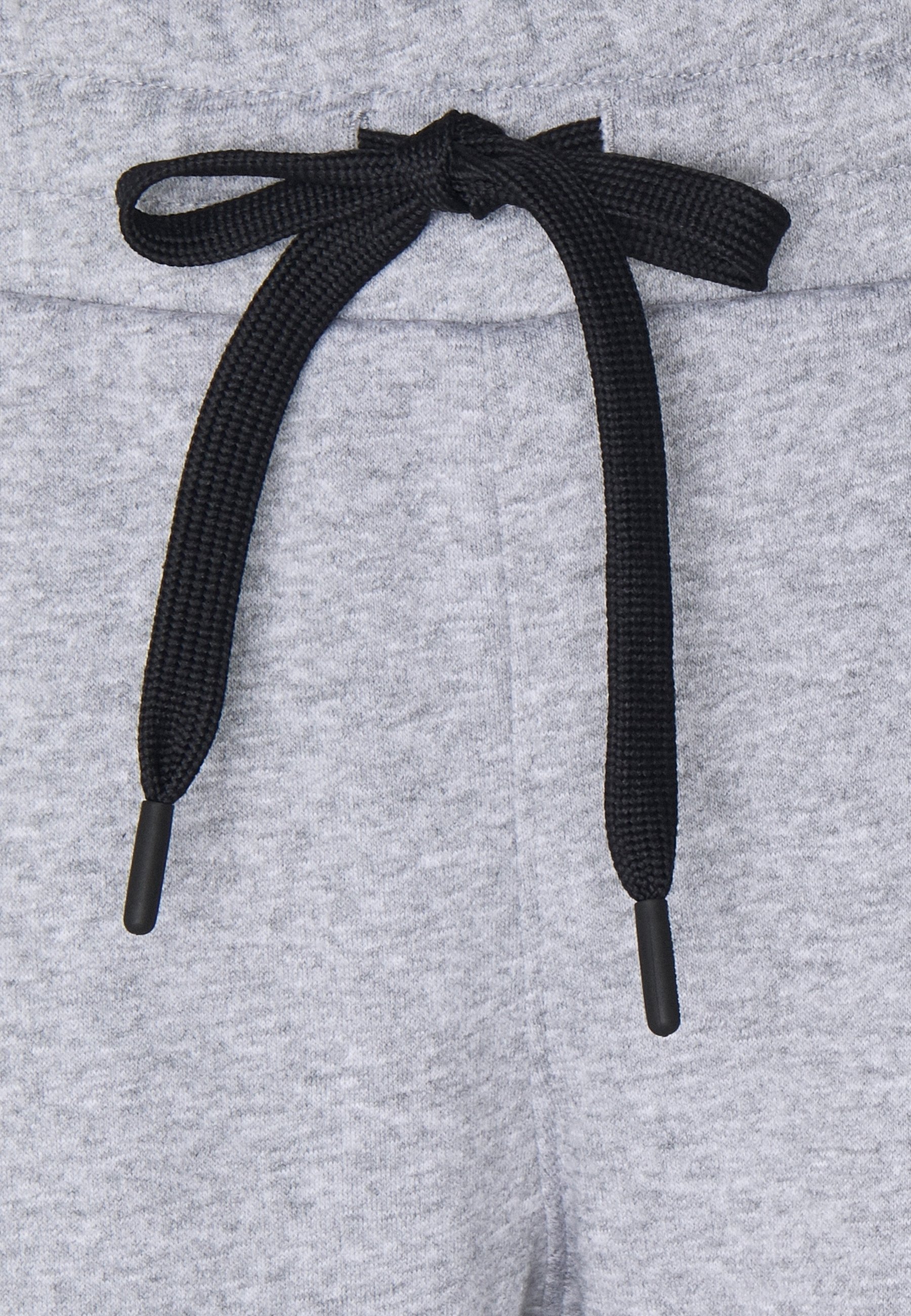 Pantaloni della tuta Under Armour - grigio chiaro