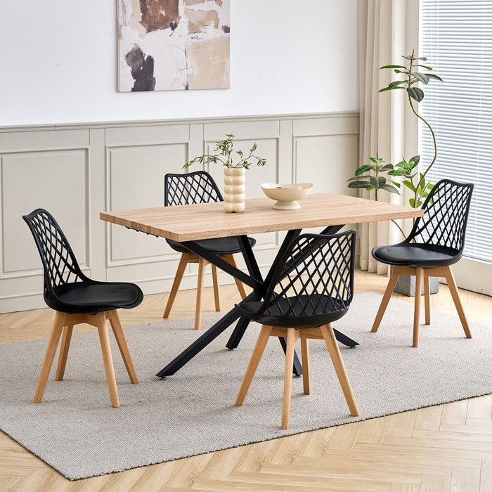 Set of 4 dining chairs - Scandinavian style (black), solid wood legs - openwork back
