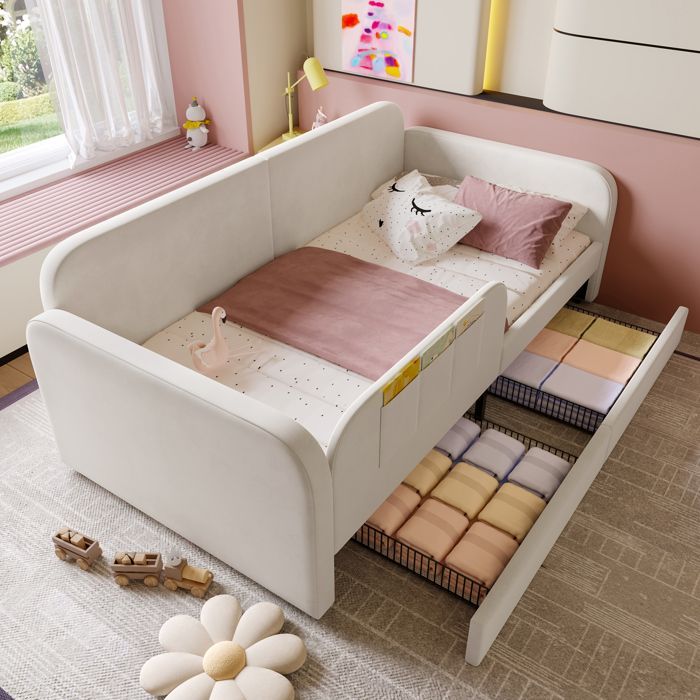 Cama infantil de 90x200 cm tapizada en terciopelo blanco con 2 cajones, 3 bolsillos laterales y somier de láminas metálicas, convertible en cama para padres e hijos.