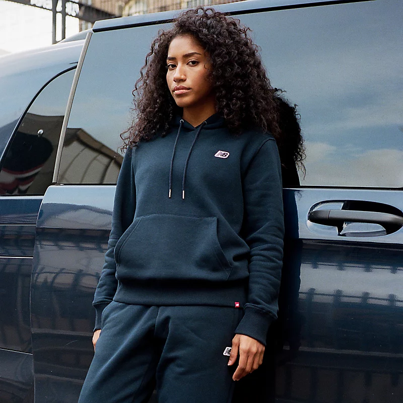 Sweat-shirts New Balance pour femmes avec petit logo - CHAMPIGNON