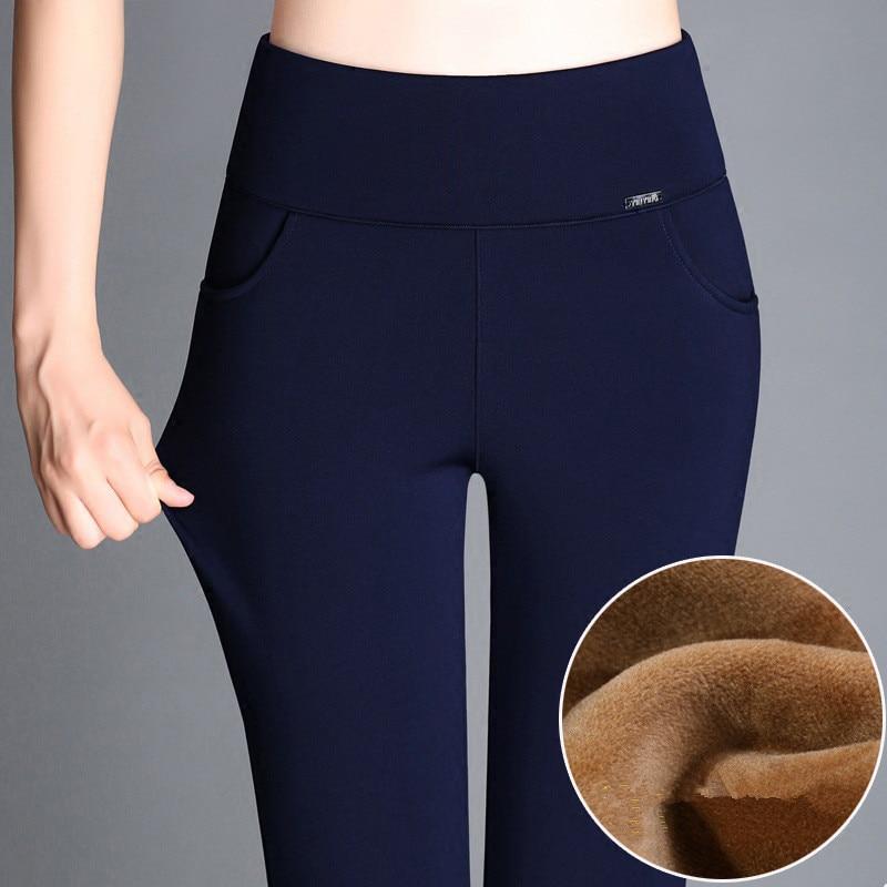 Pantaloni invernali caldi e spessi in velluto dorato taglie forti 5XL 6XL, pantaloni slim a vita alta elasticizzati in pile, leggings blu da donna con stivali.