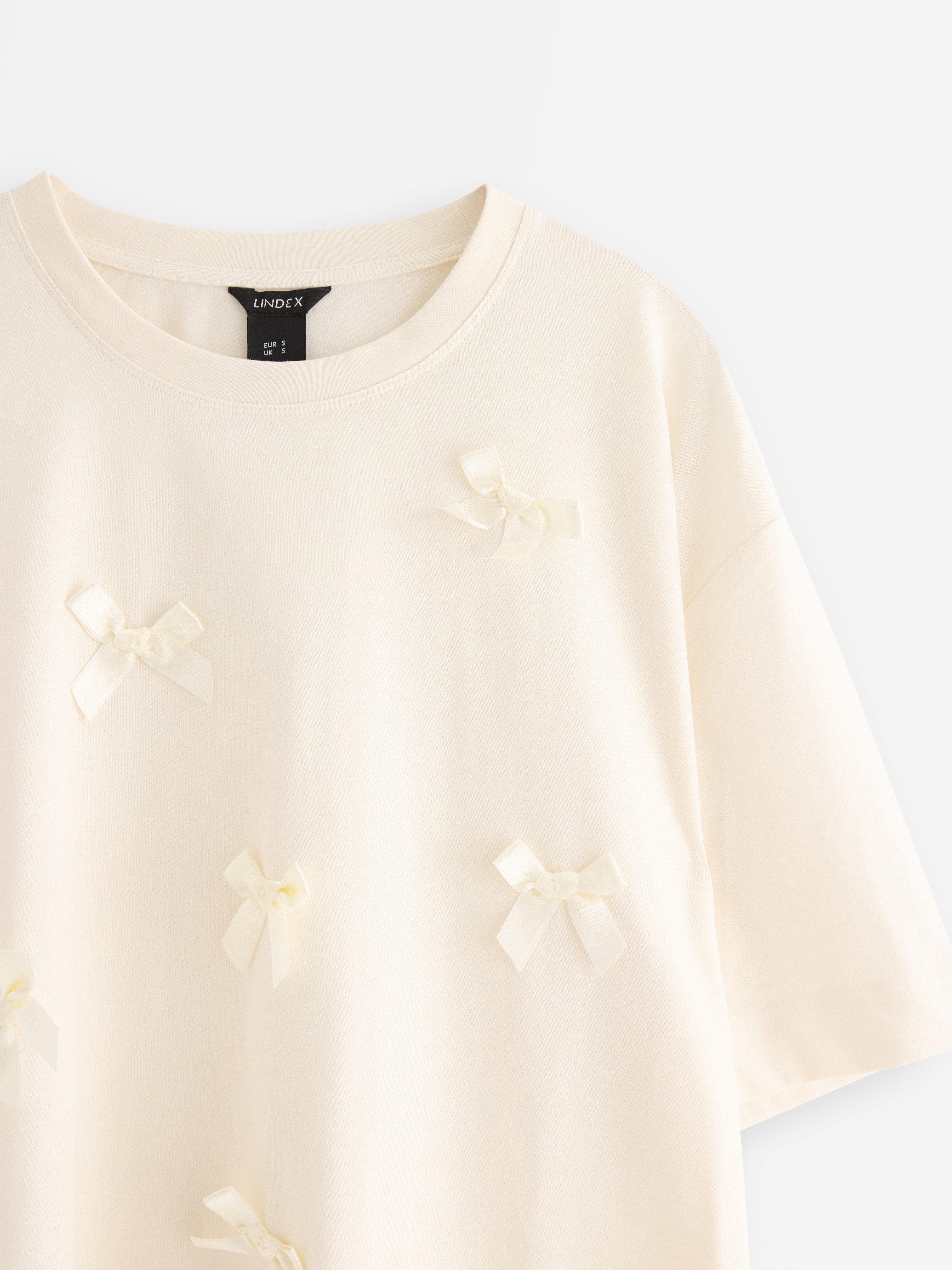 T-shirt med rosetter Light White