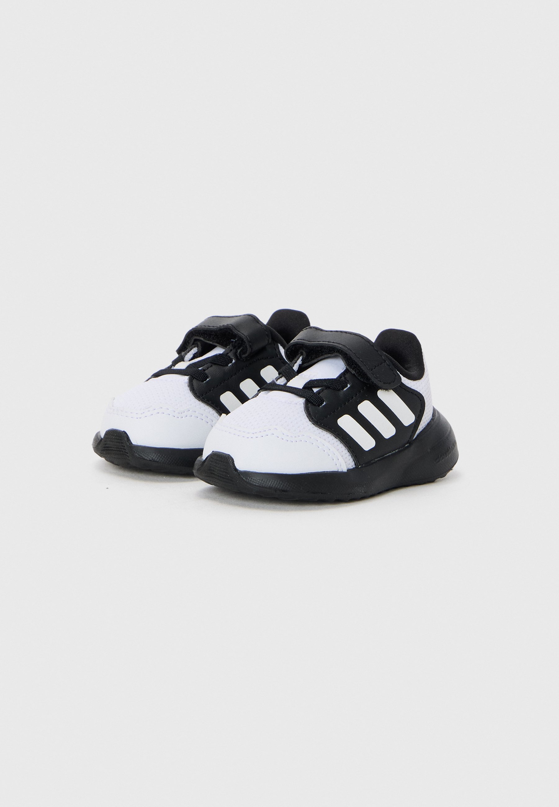 adidas Performance TENSAUR UNISEX - Chaussures de running sur route - Noir/Blanc