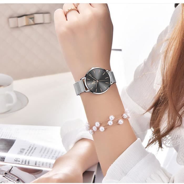 Reloj de diseño ultrafino para mujer con brazalete clásico de acero, resistente al agua, color negro.