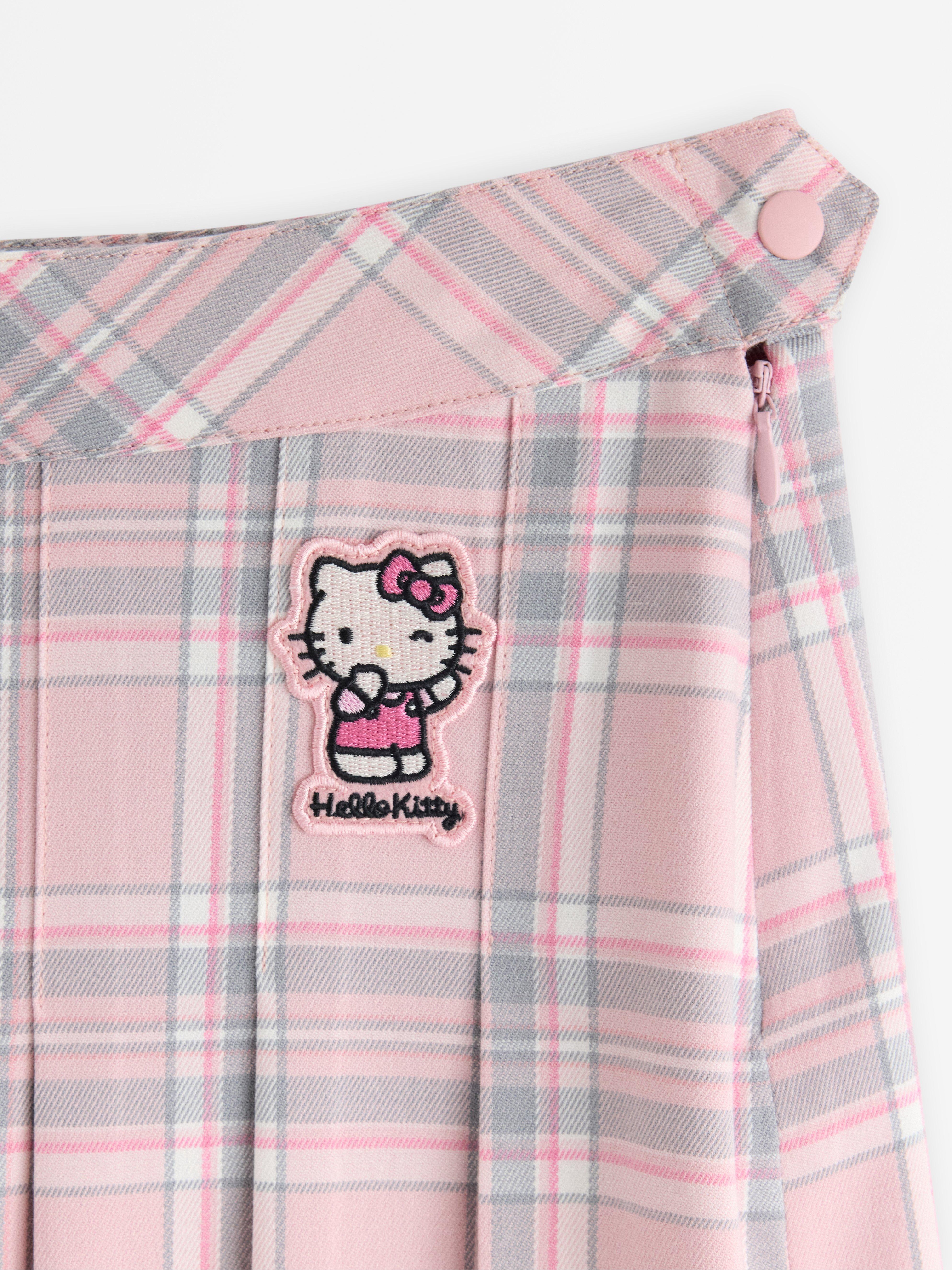 Saia plissada Hello Kitty rosa claro