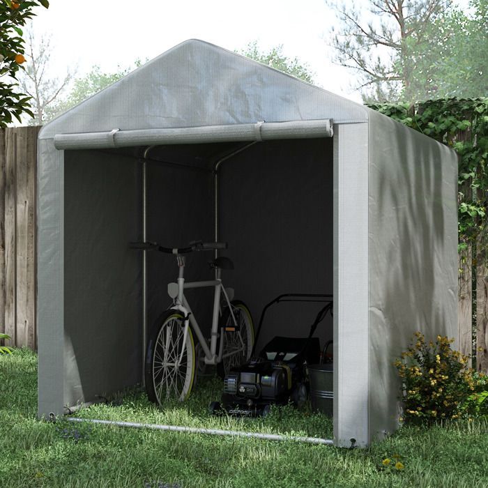 Caseta de jardín Outsunny con puerta enrollable y cremallera, ideal para bicicletas, motocicletas, leña y herramientas. Medidas: 160 x 218 x 172 cm. Color: gris claro.