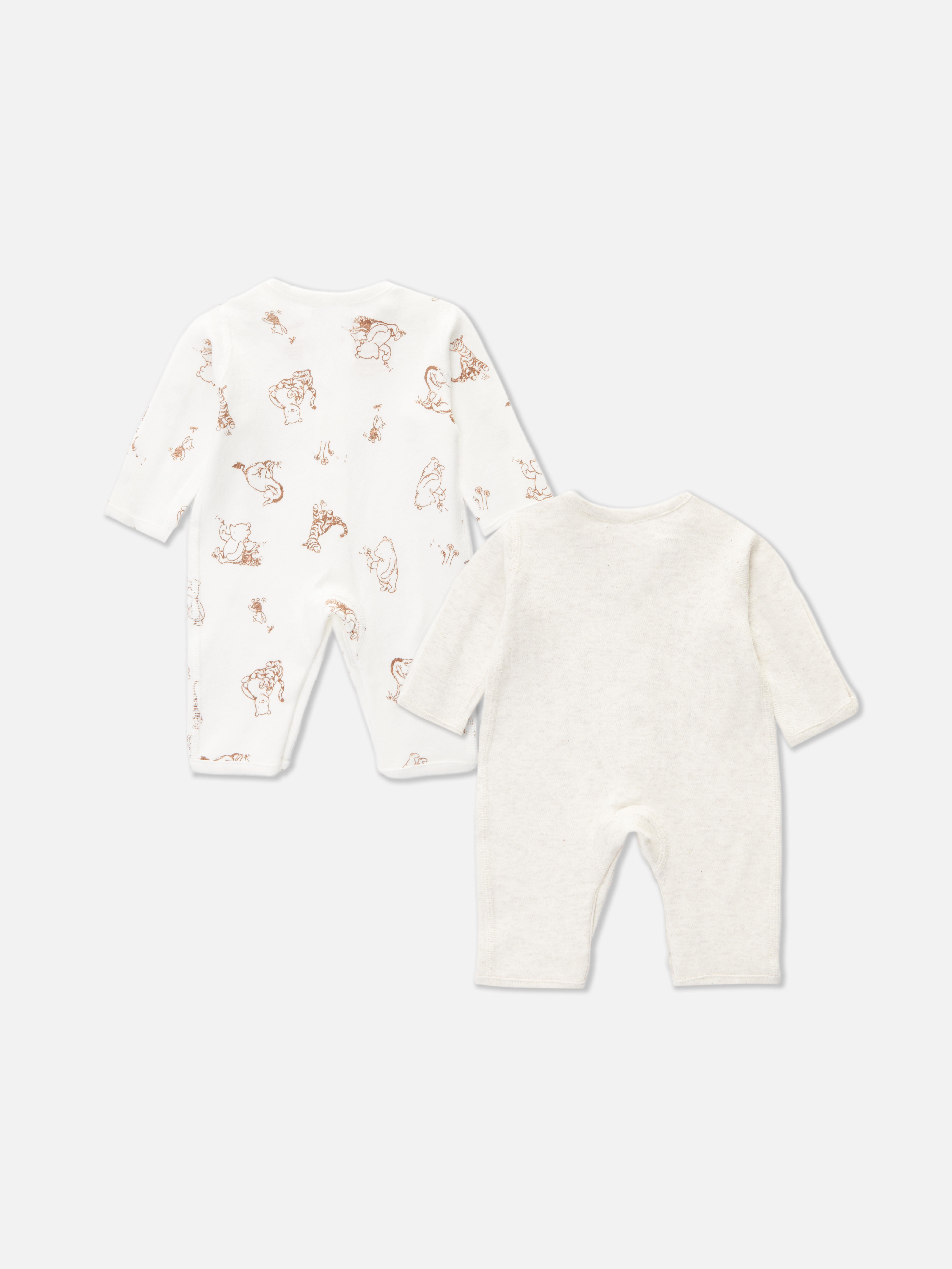 Pijamale Disney pentru bebeluși prematuri, set de 2. Două pijamale drăguțe cu Winnie the Pooh de la Disney pentru bebeluși prematuri.