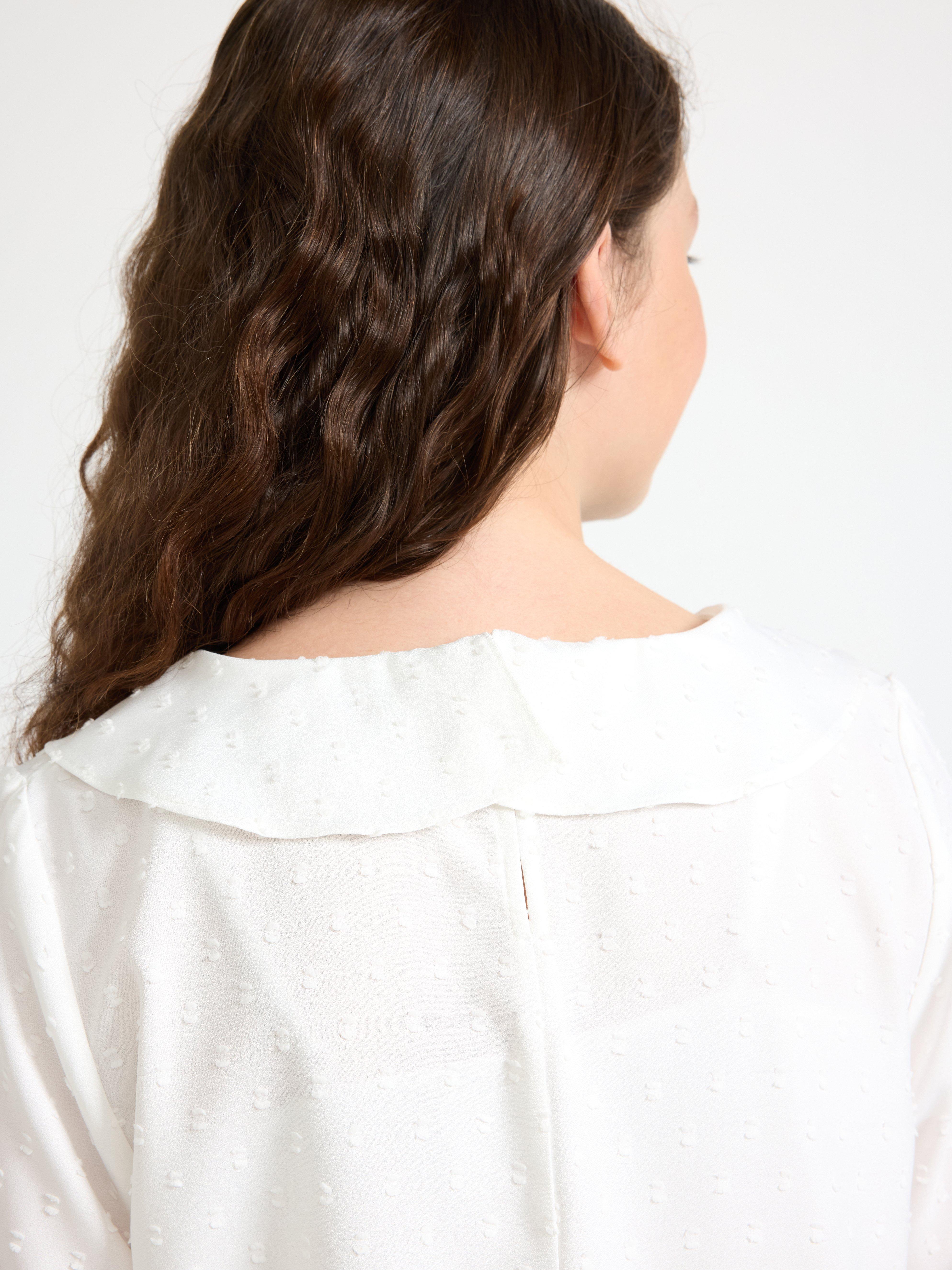 Blusa de manga larga color blanco roto