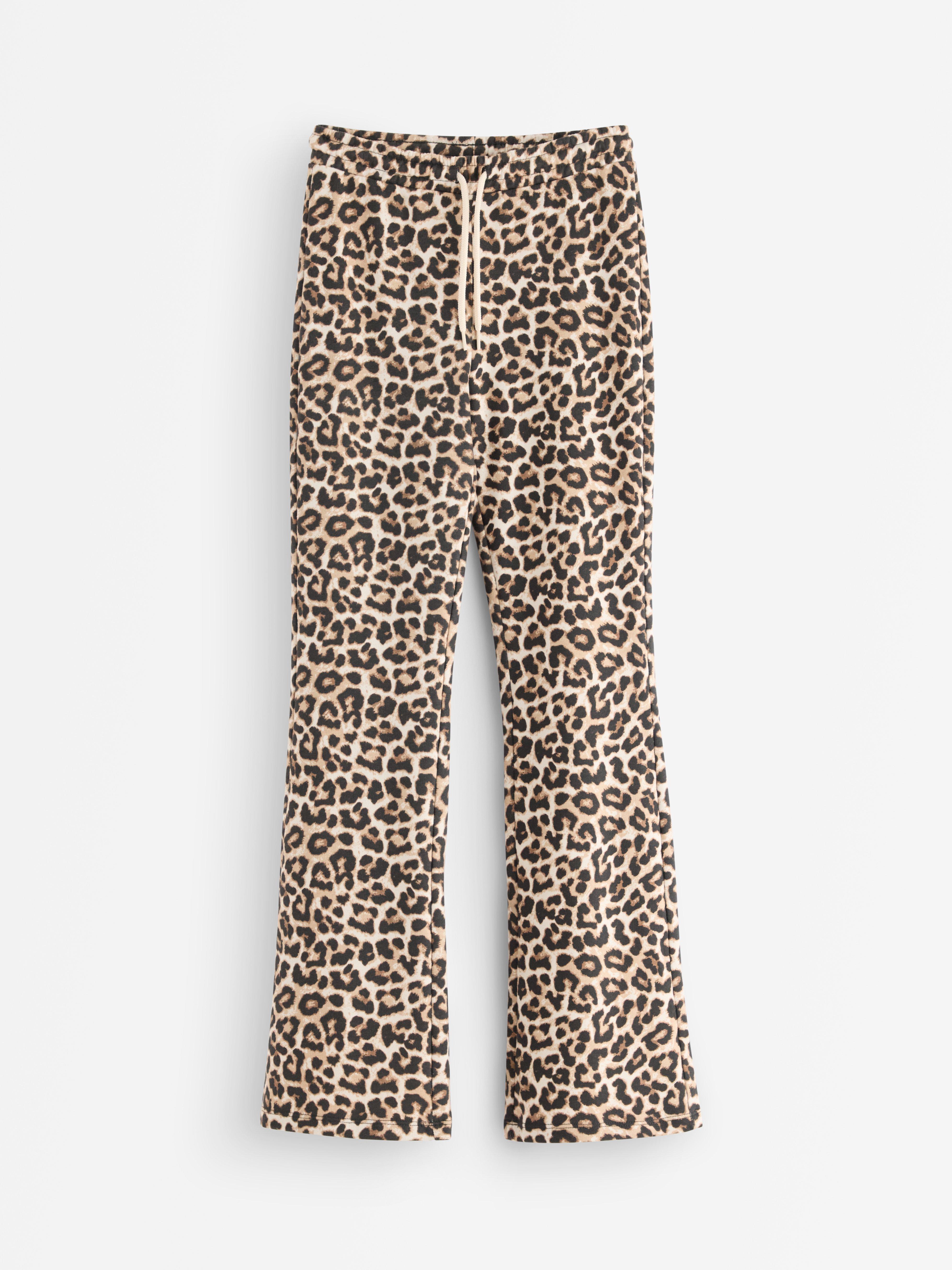 Calça de moletom boca de sino bege