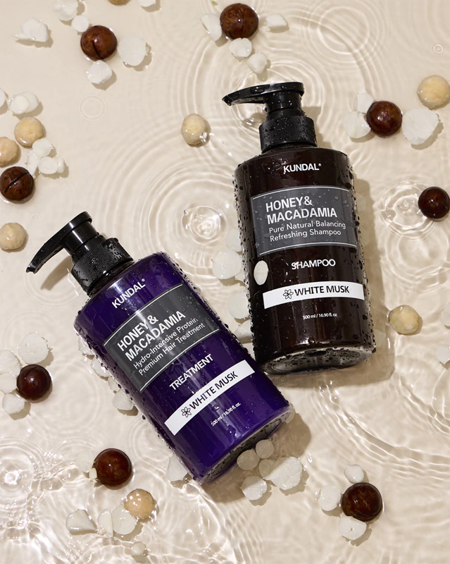 Shampoo natural KUNDAL com mel e almíscar branco de macadâmia para cabelos secos e danificados.