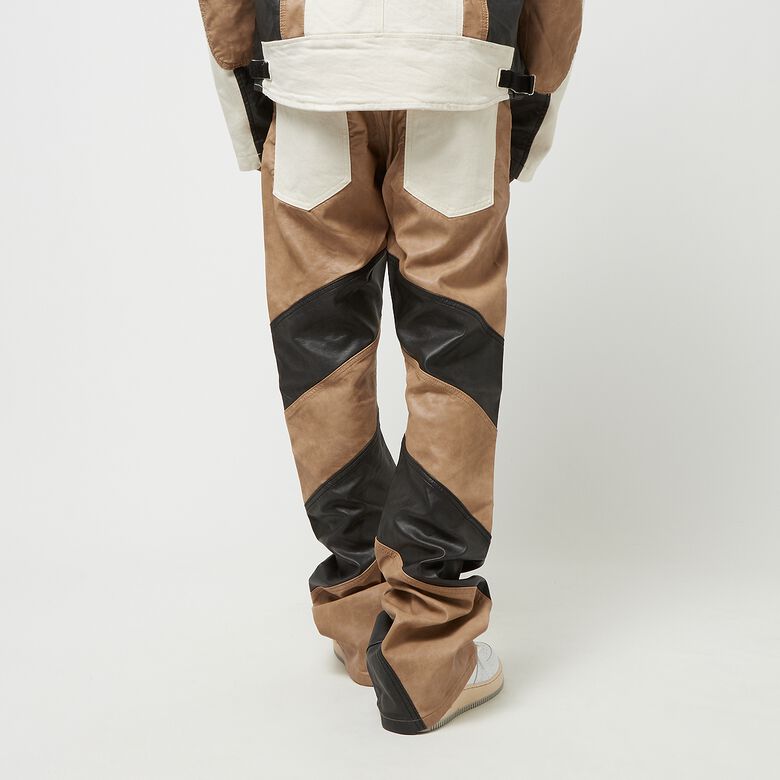 Pantalones Premium de mezcla de PU con diseño apilado