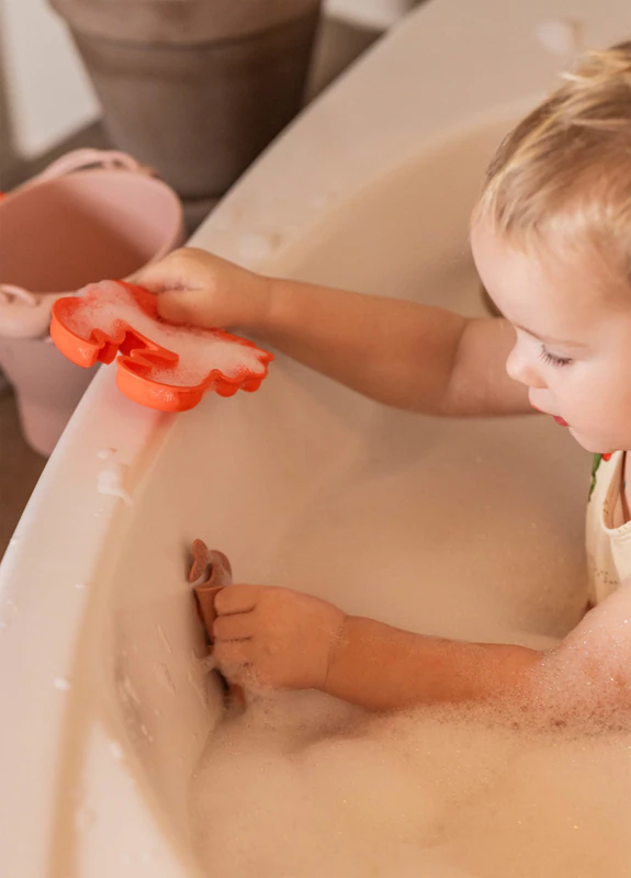 Brinquedo de areia de silicone FILIBABBA com sabor de pêssego e água.