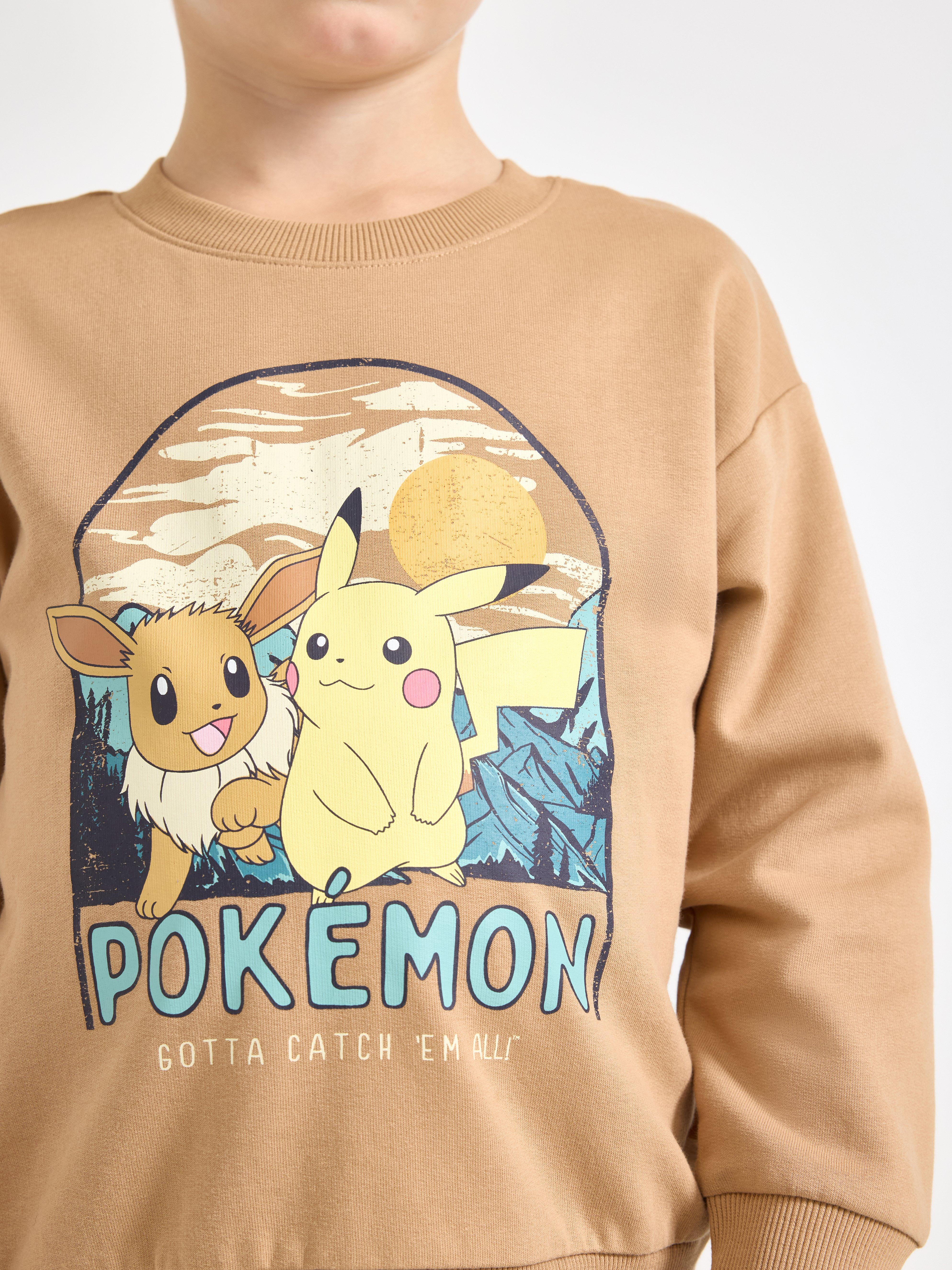 Pokémon dukserica svijetlo bež boje
