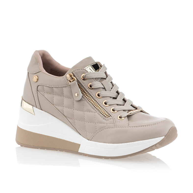 Zapatillas deportivas para mujer color beige.