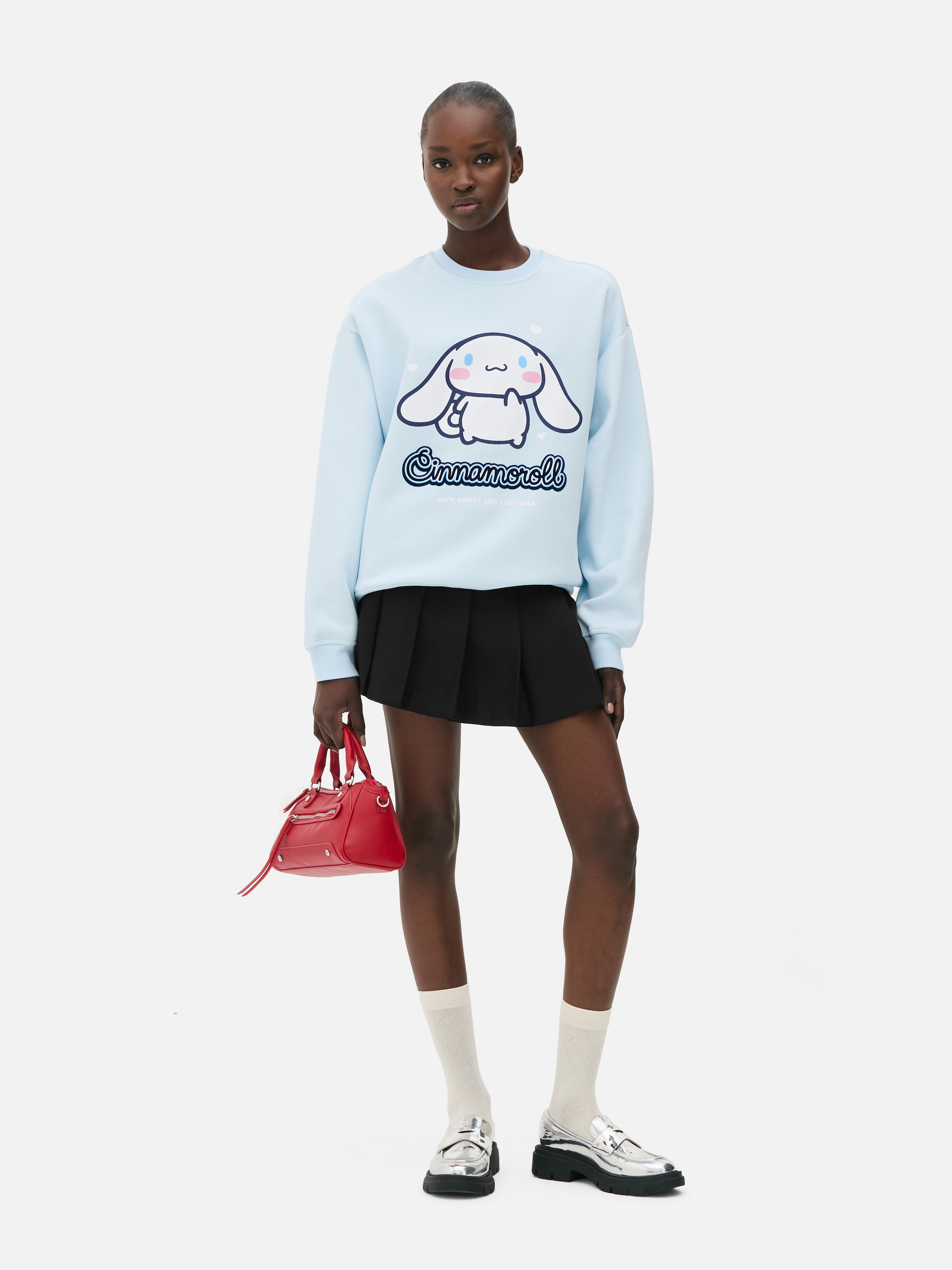 Φούτερ Hello Kitty με στάμπα Cinnamoroll. Φούτερ Sanrio με στρογγυλή λαιμόκοψη, μακριές μανσέτες και ριμπ τελείωμα.