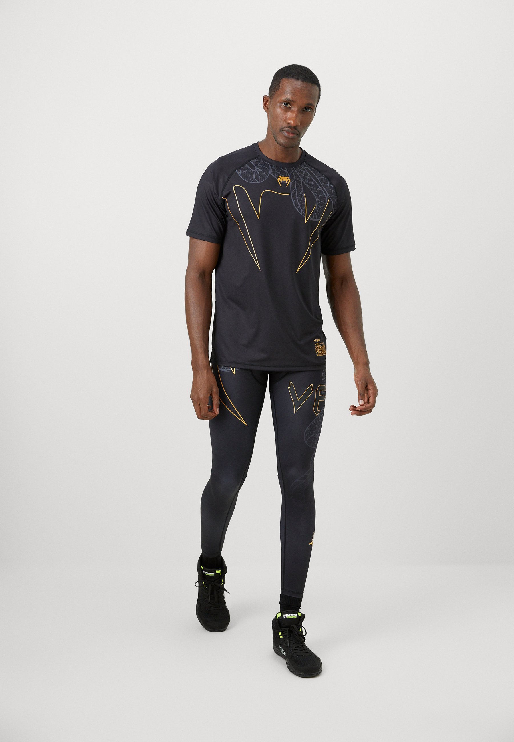 T-shirt de sport Venum SERPENTI DRY TECH - noir/argent/or