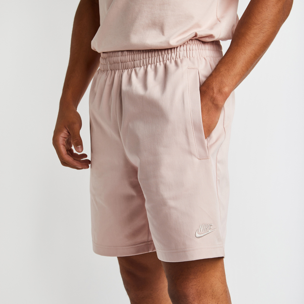 Nike T100