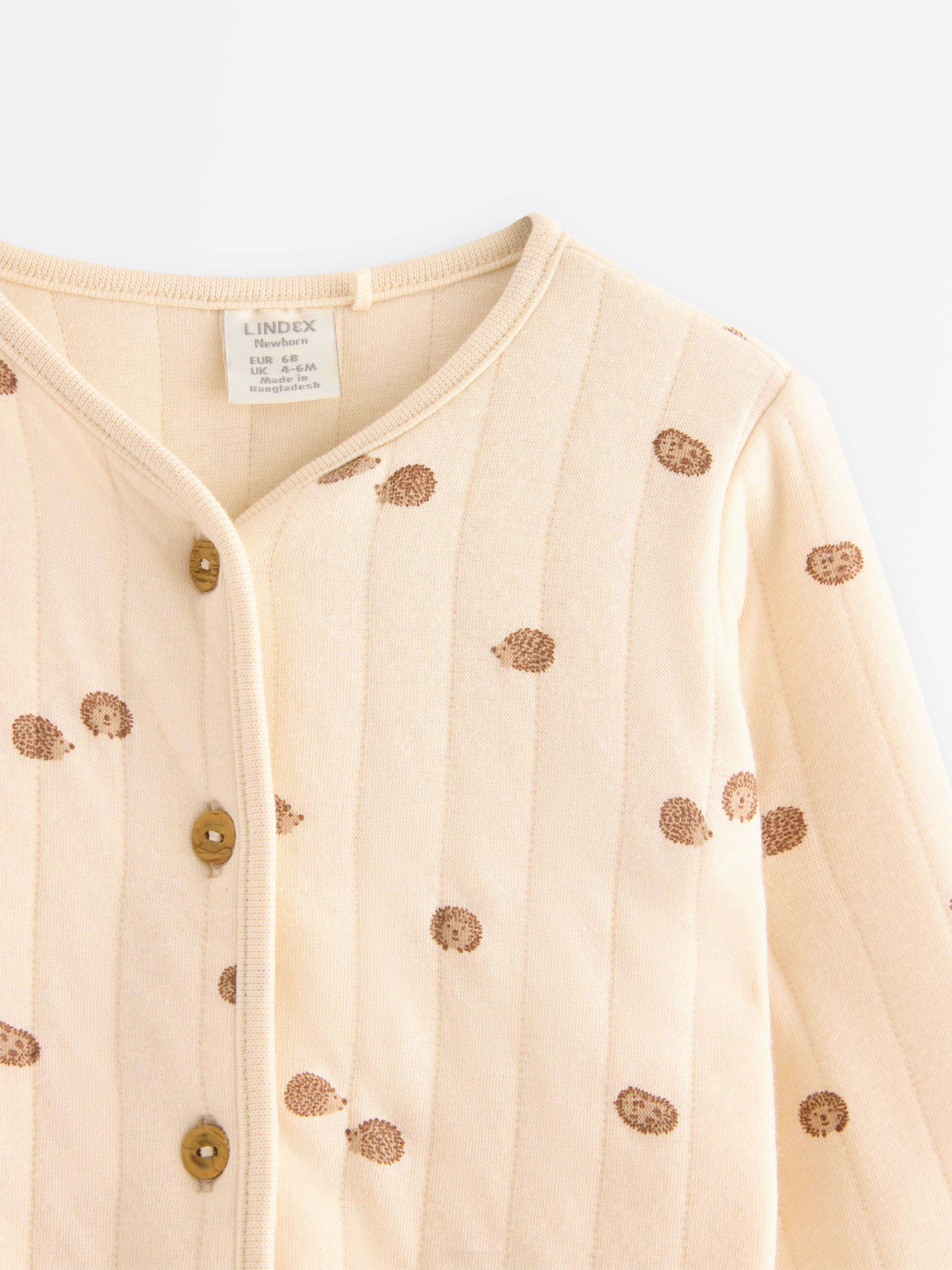 Giacca trapuntata in tricot beige chiaro