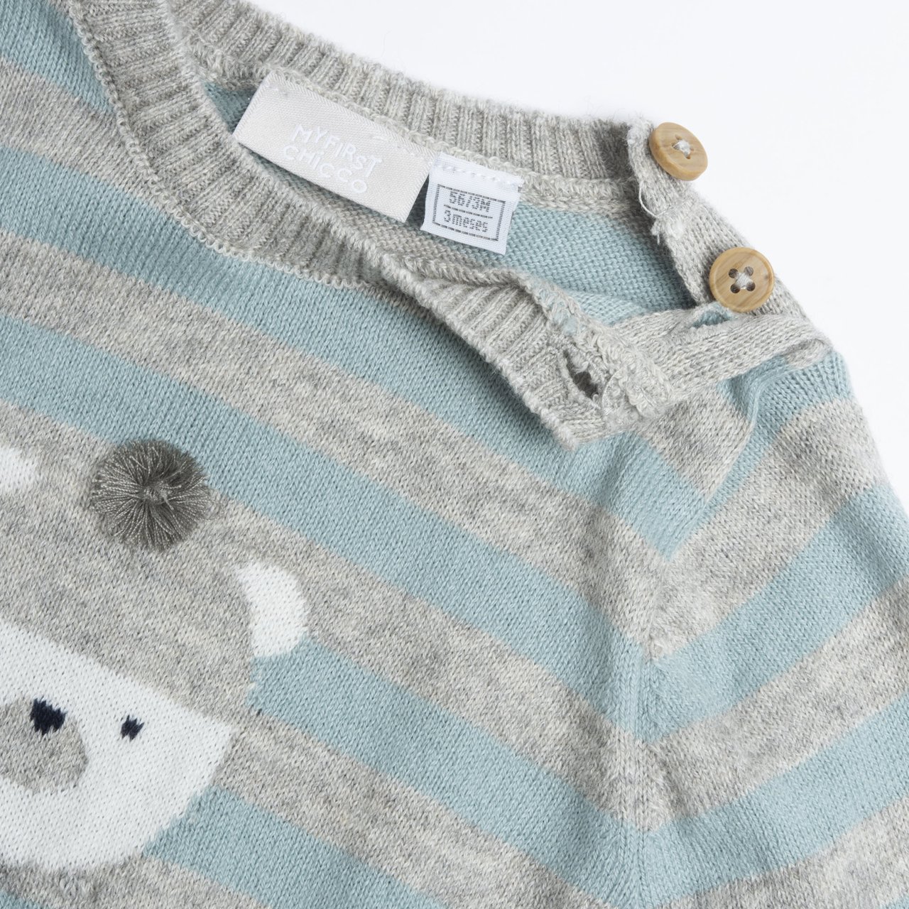 Niebieski sweterek w paski z misiem