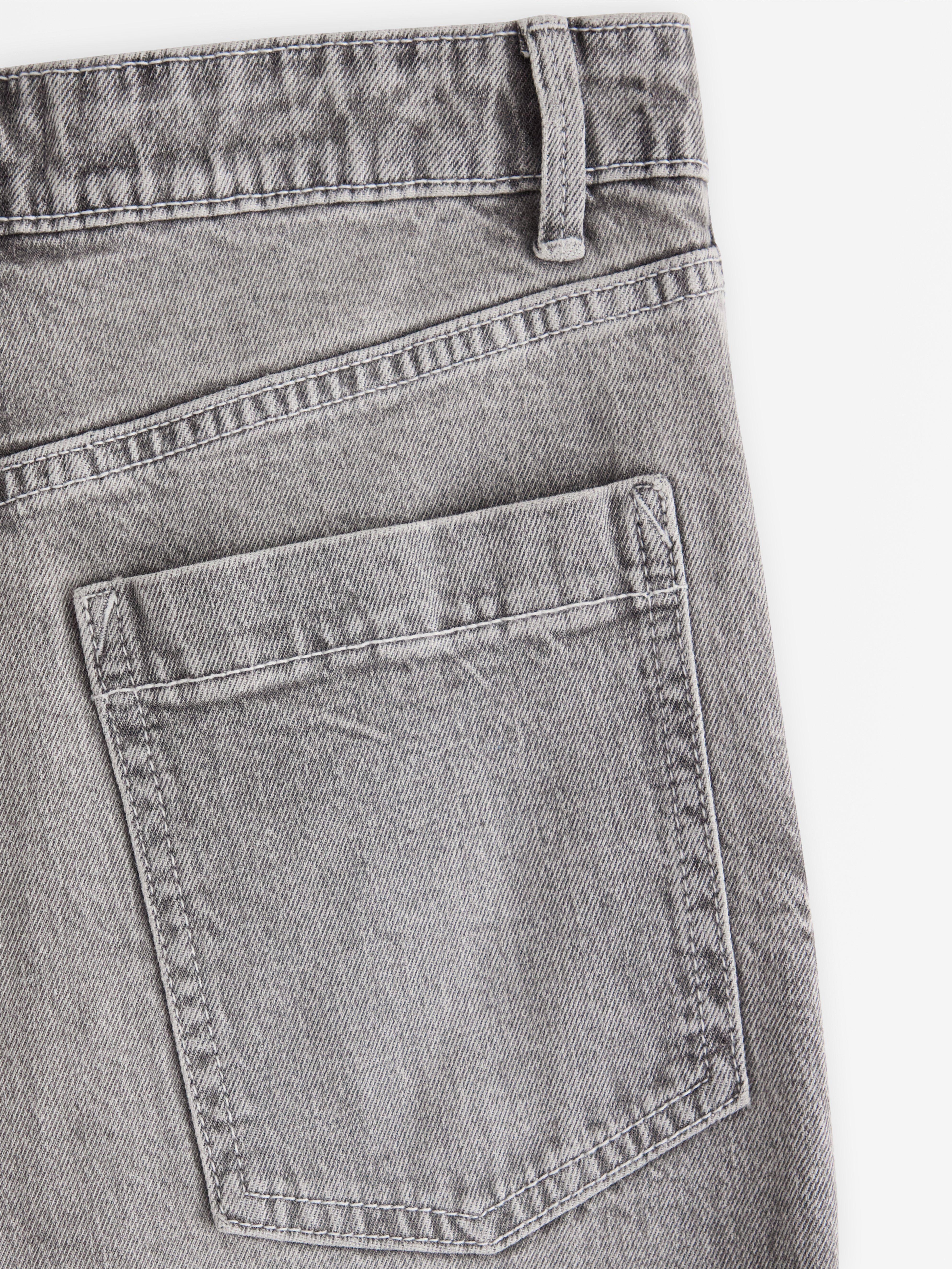Pantalones vaqueros VEGA de pierna ancha, color gris.