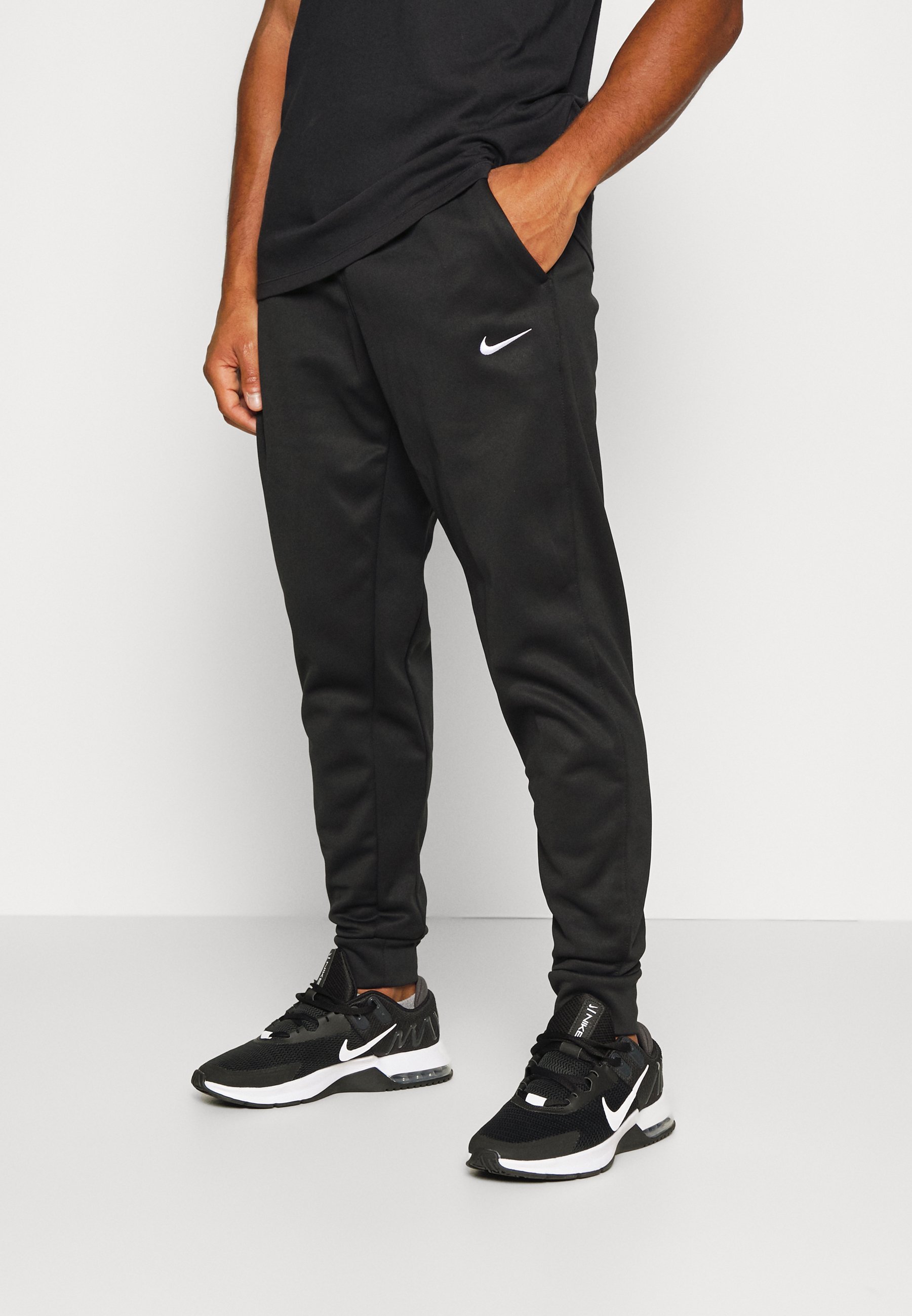Nike Performance TAPER - Spodnie dresowe - czarno-białe