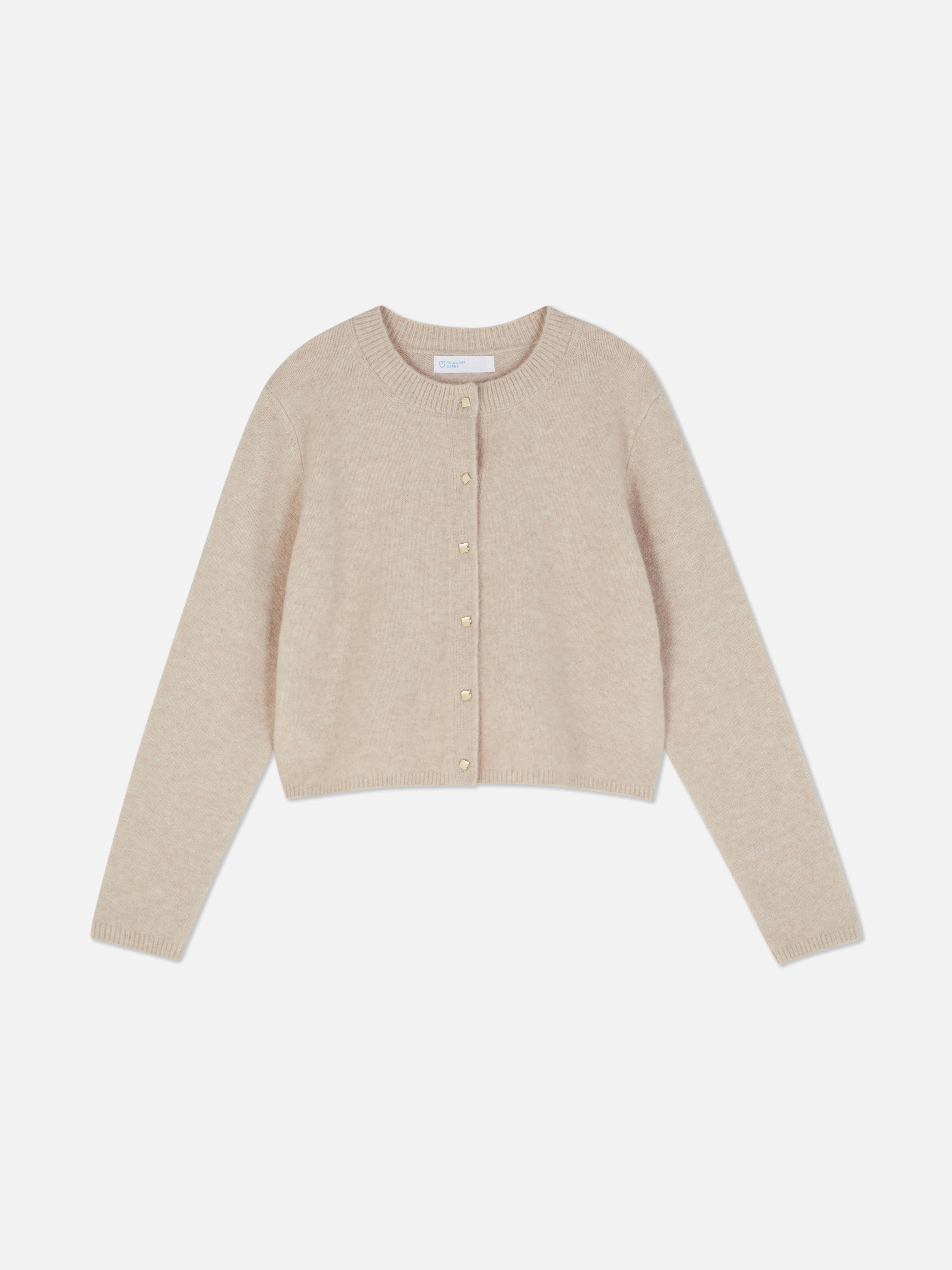 Cardigan lavorato a maglia con bottoni. Questo cardigan lavorato a maglia con bottoni è il tocco caldo perfetto per i tuoi outfit.