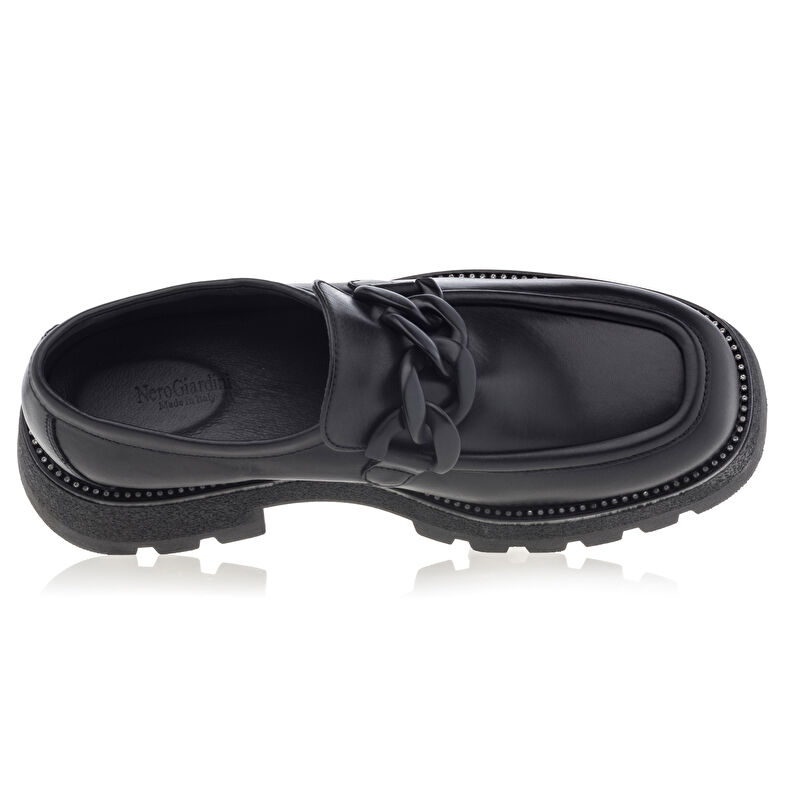 Naisten mustat loaferit/veneilykengät