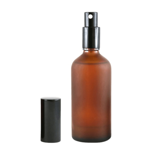 100 ml sprayflaska i frostat bärnstensfärgat glas