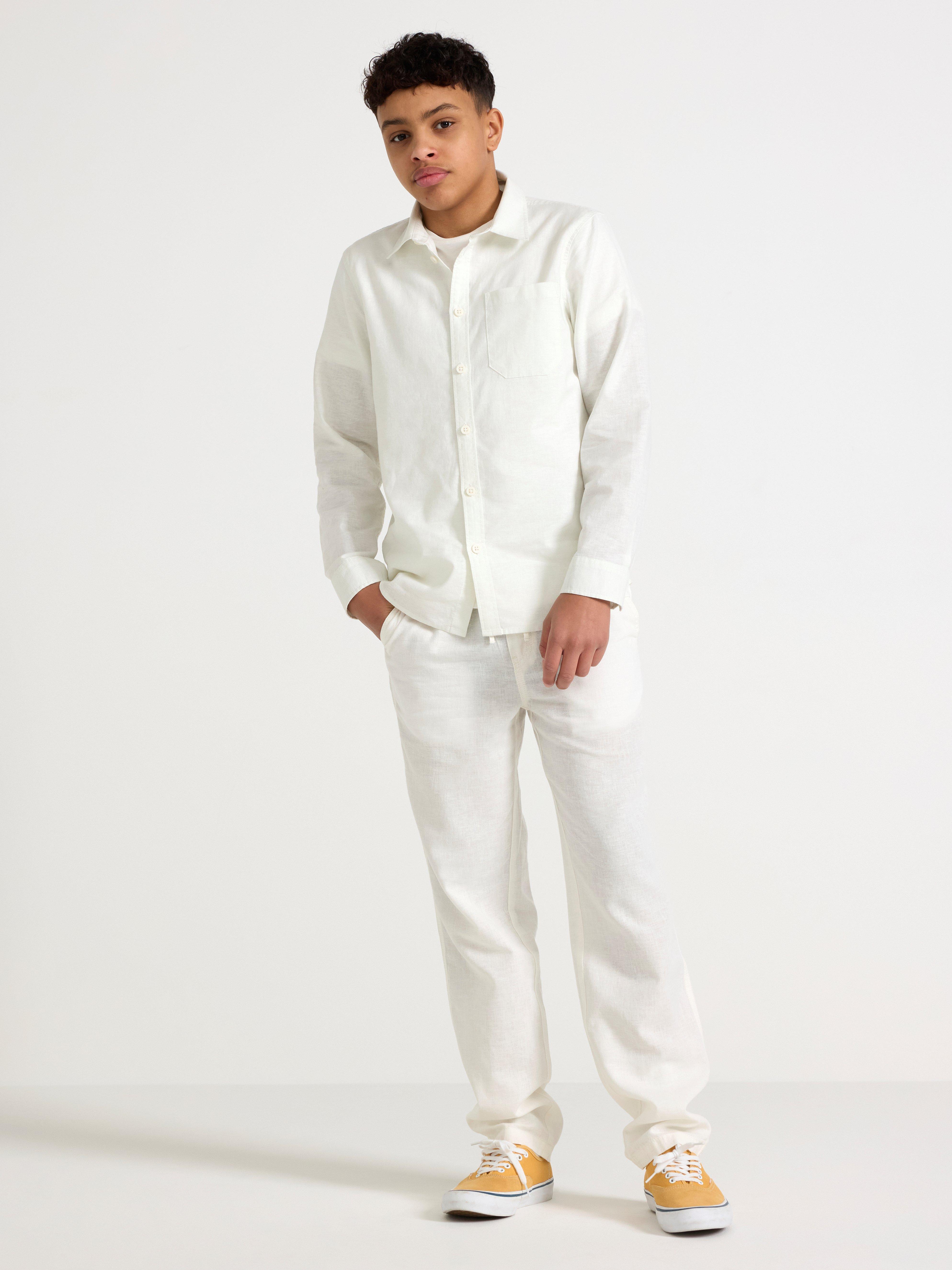Pantalones rectos STAFFAN de mezcla de lino, color blanco roto.