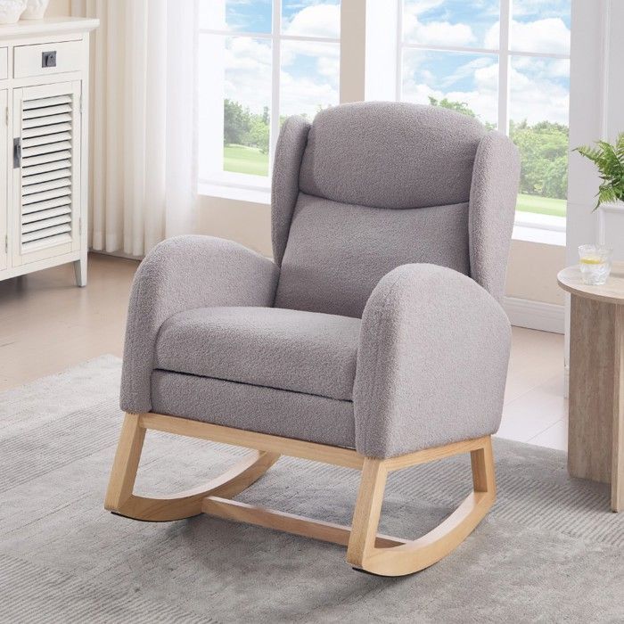 Fauteuil d'allaitement gris à bascule, dossier haut et repose-pieds réglable avec poche. Confortable pour salon et chambre.