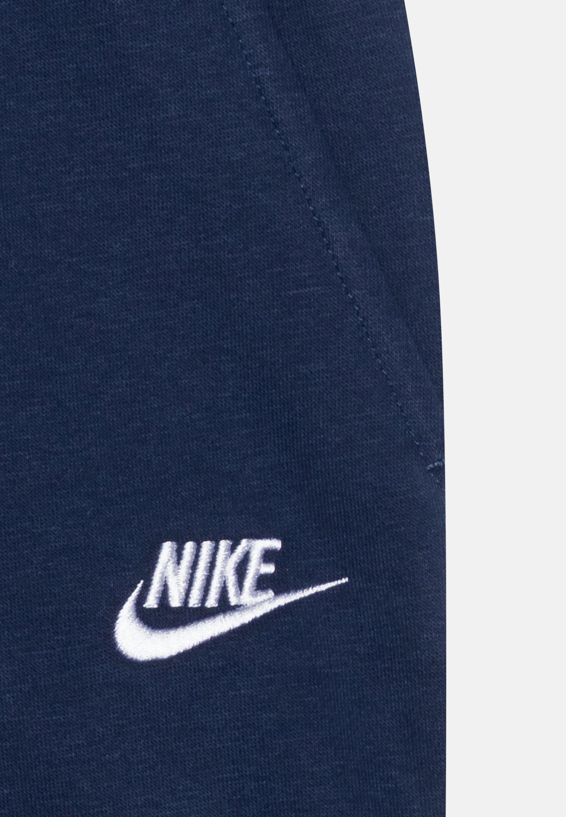 Nike Sportswear CLUB UNISEX - Trainingsbroek - middernachtblauw/wit