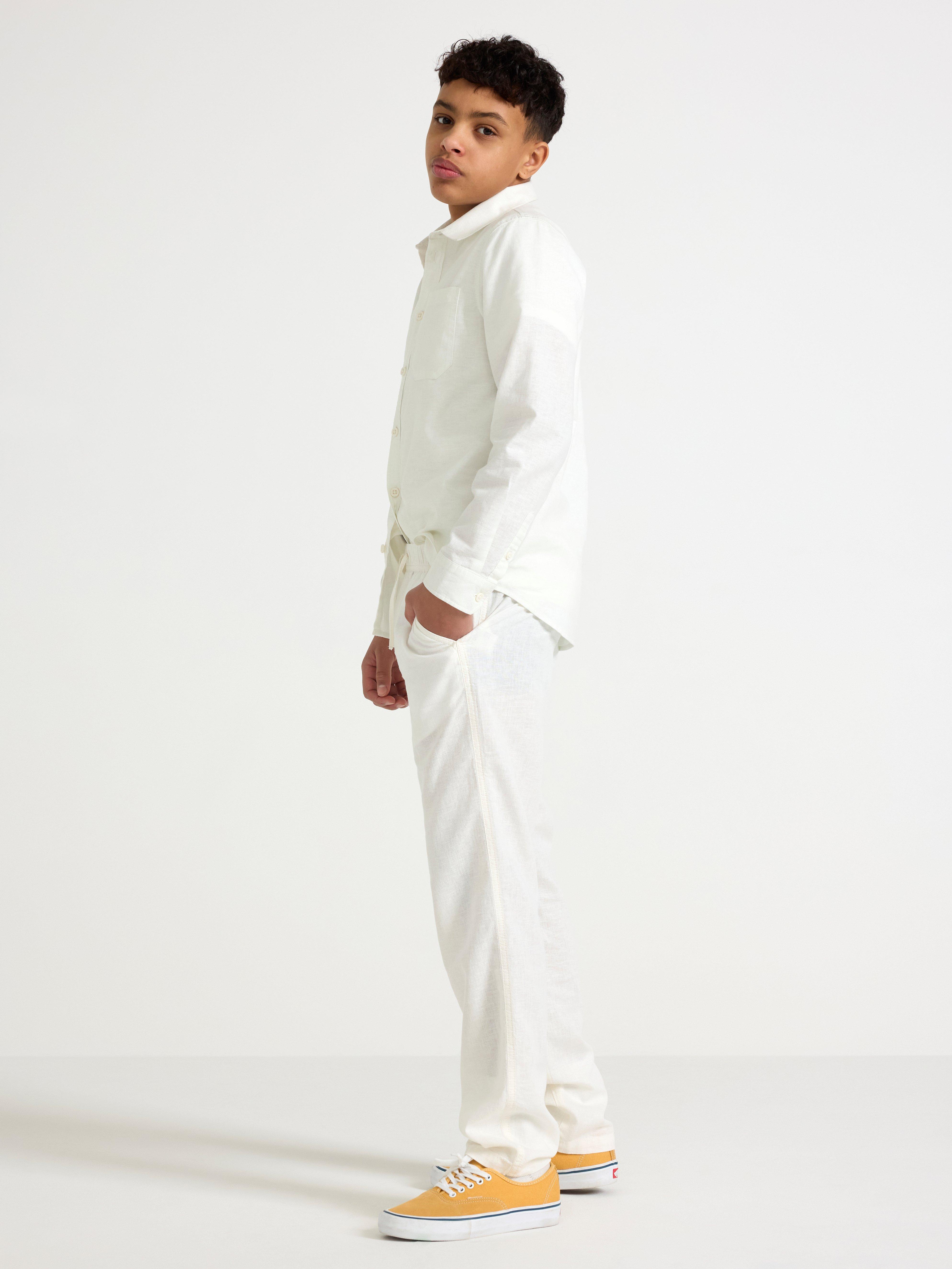 Pantalones rectos STAFFAN de mezcla de lino, color blanco roto.