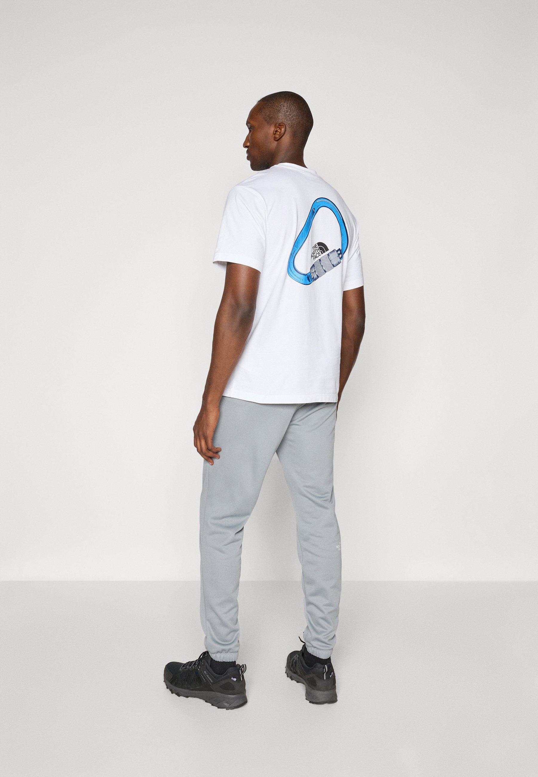 Pantaloni da tuta The North Face REAXION JOGGER - grigio monumento/grigio scuro