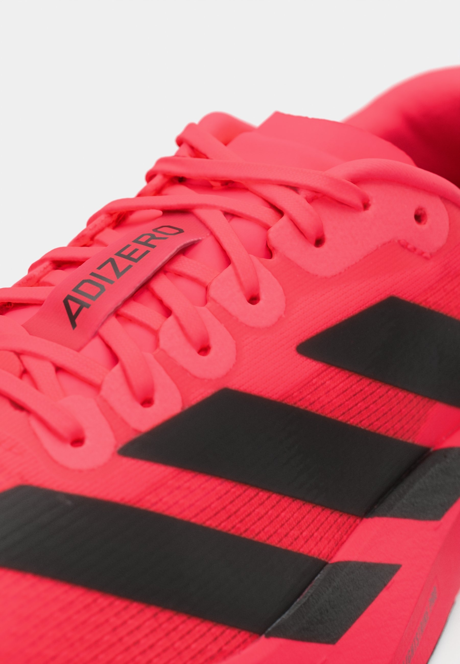 adidas Performance ADIZERO EVO SL - Hardloopschoenen voor op de weg - helder rood/kernzwart