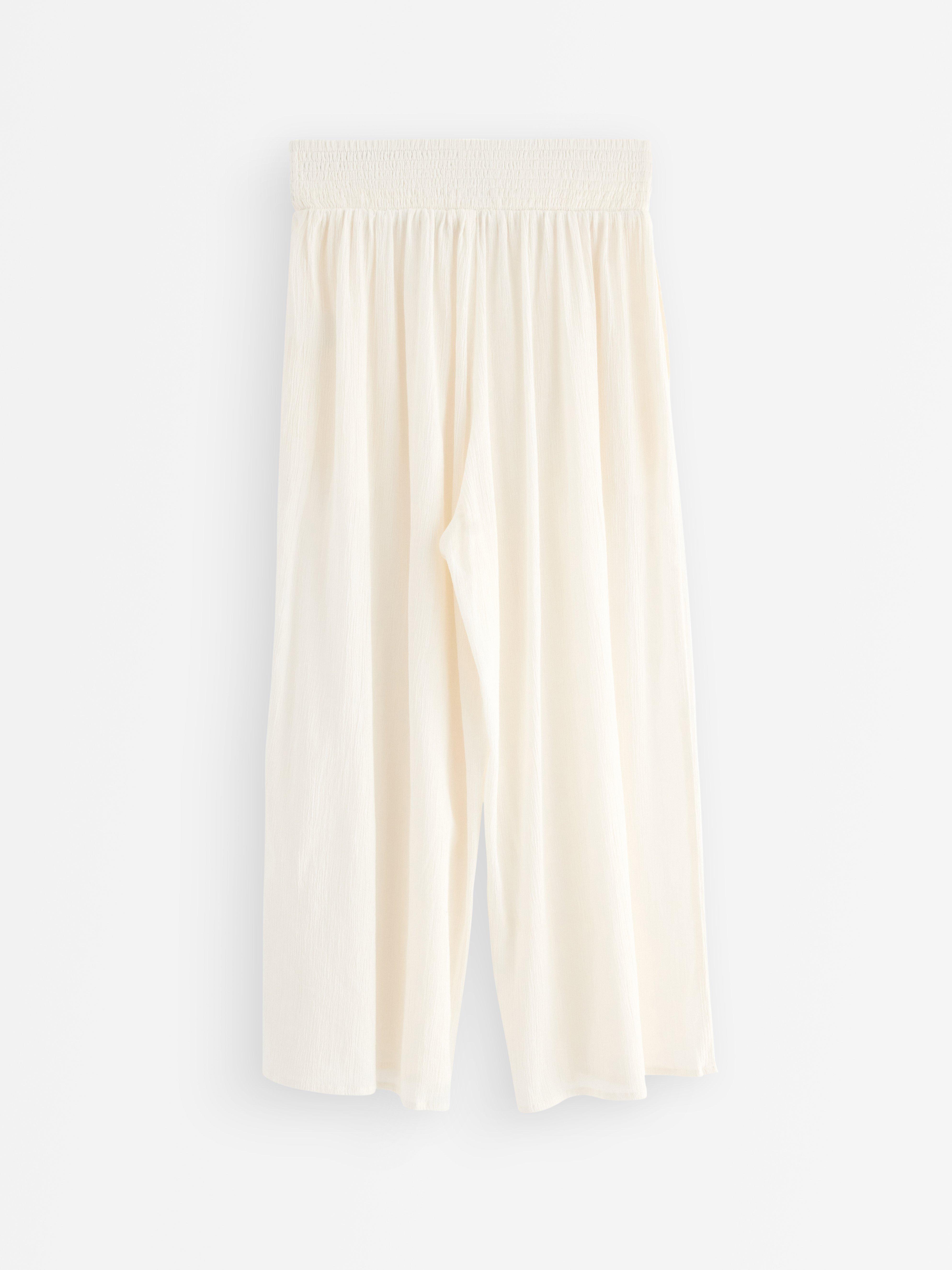 Pantalones anchos cortos blancos